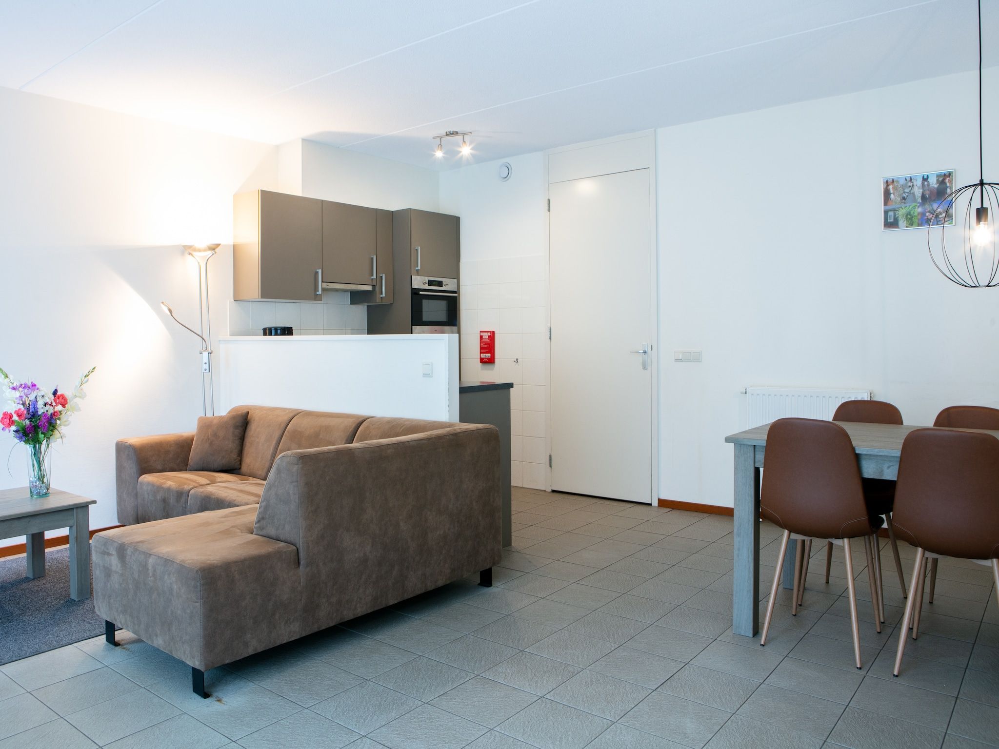 De woonkamer van Vakantiepark Horsetellerie 4 in Hardenberg (rheezerveen)