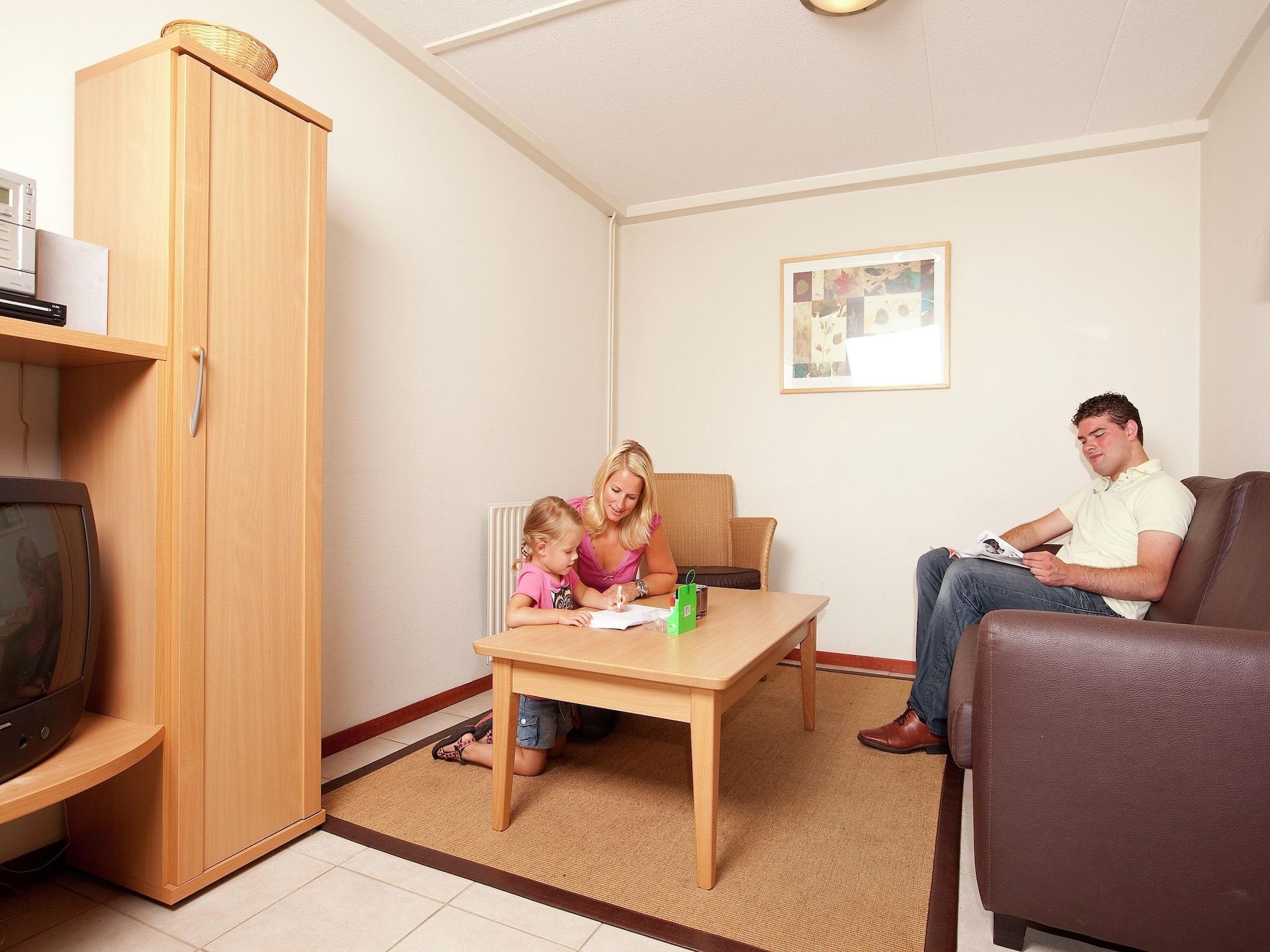 De woonkamer van Vakantiepark de Berkenhorst 2 in Kootwijk