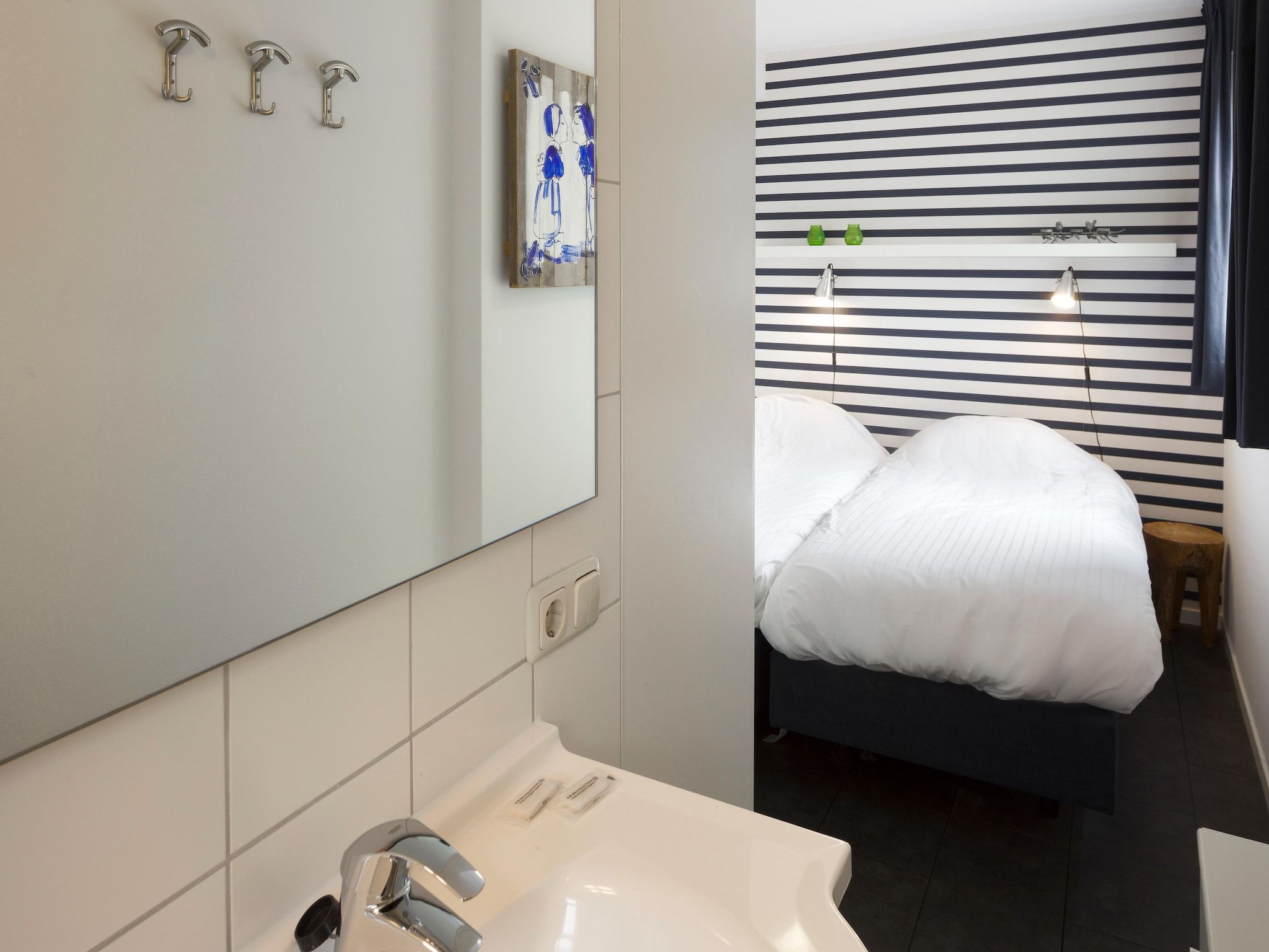 Een slaapkamer van Waterpark Belterwiede 4 in Wanneperveen