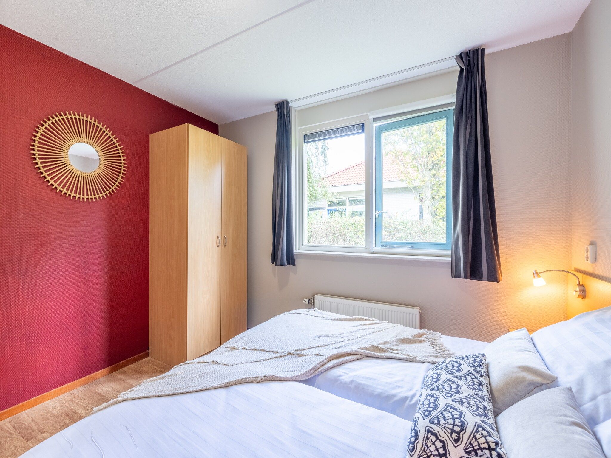 Een slaapkamer van Villavakantiepark IJsselhof 2 in Andijk
