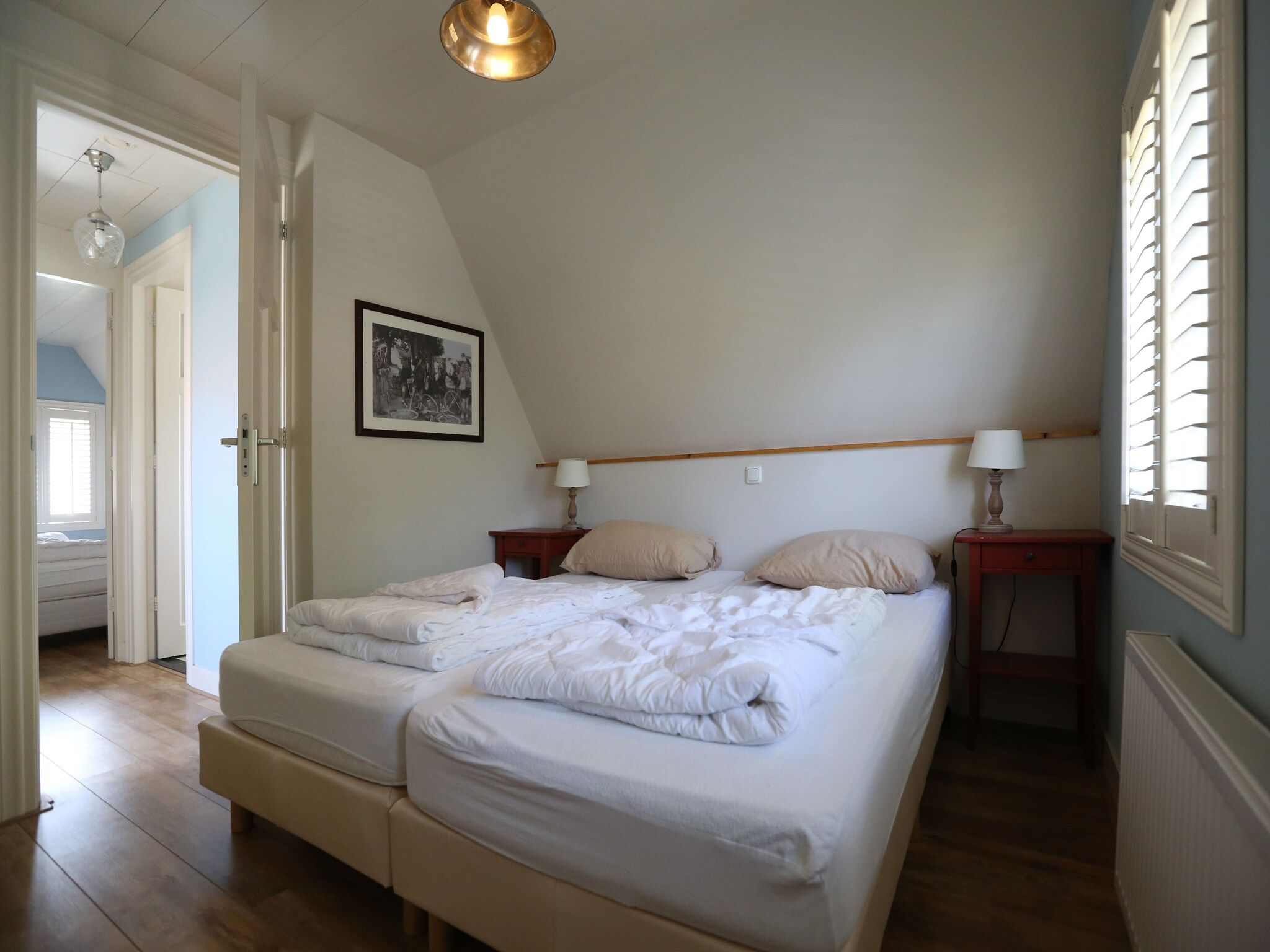 Een slaapkamer van Recreatiepark Wiringherlant  - Villa 4 in Hippolytushoef