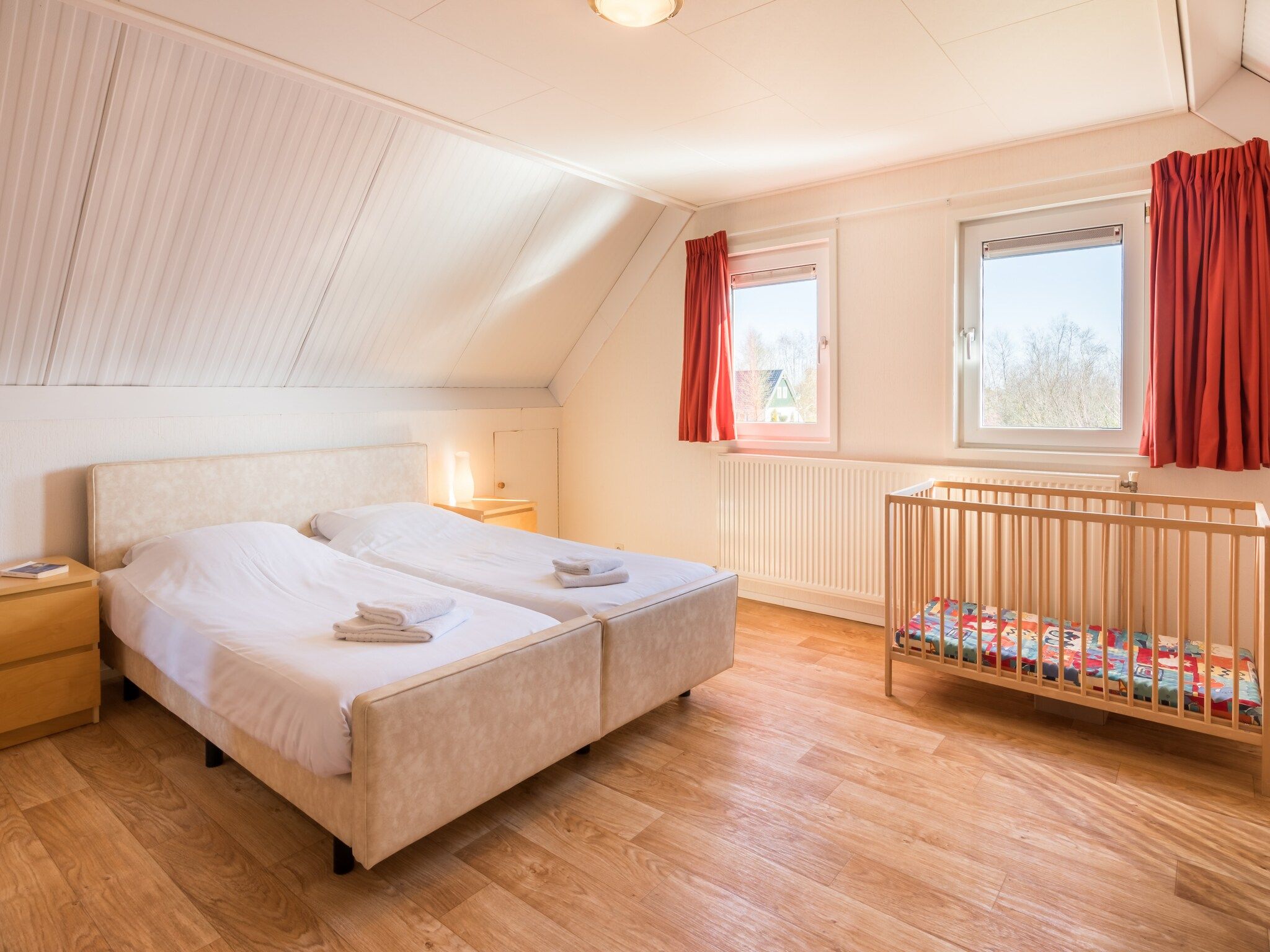 Een slaapkamer van Hunzepark 7 in Gasselternijveen