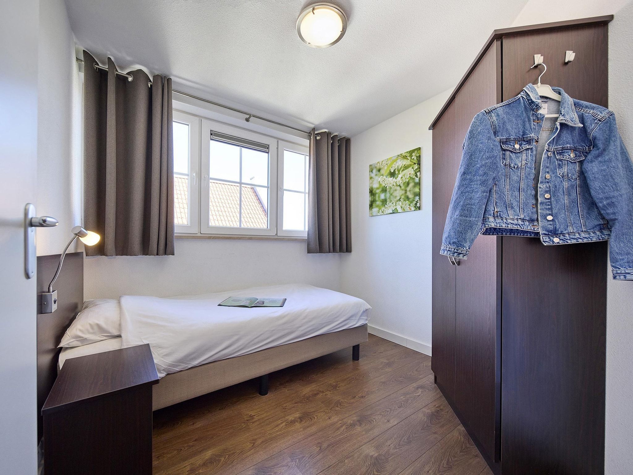 Een slaapkamer van Buitenhof De Leistert 1 in Roggel