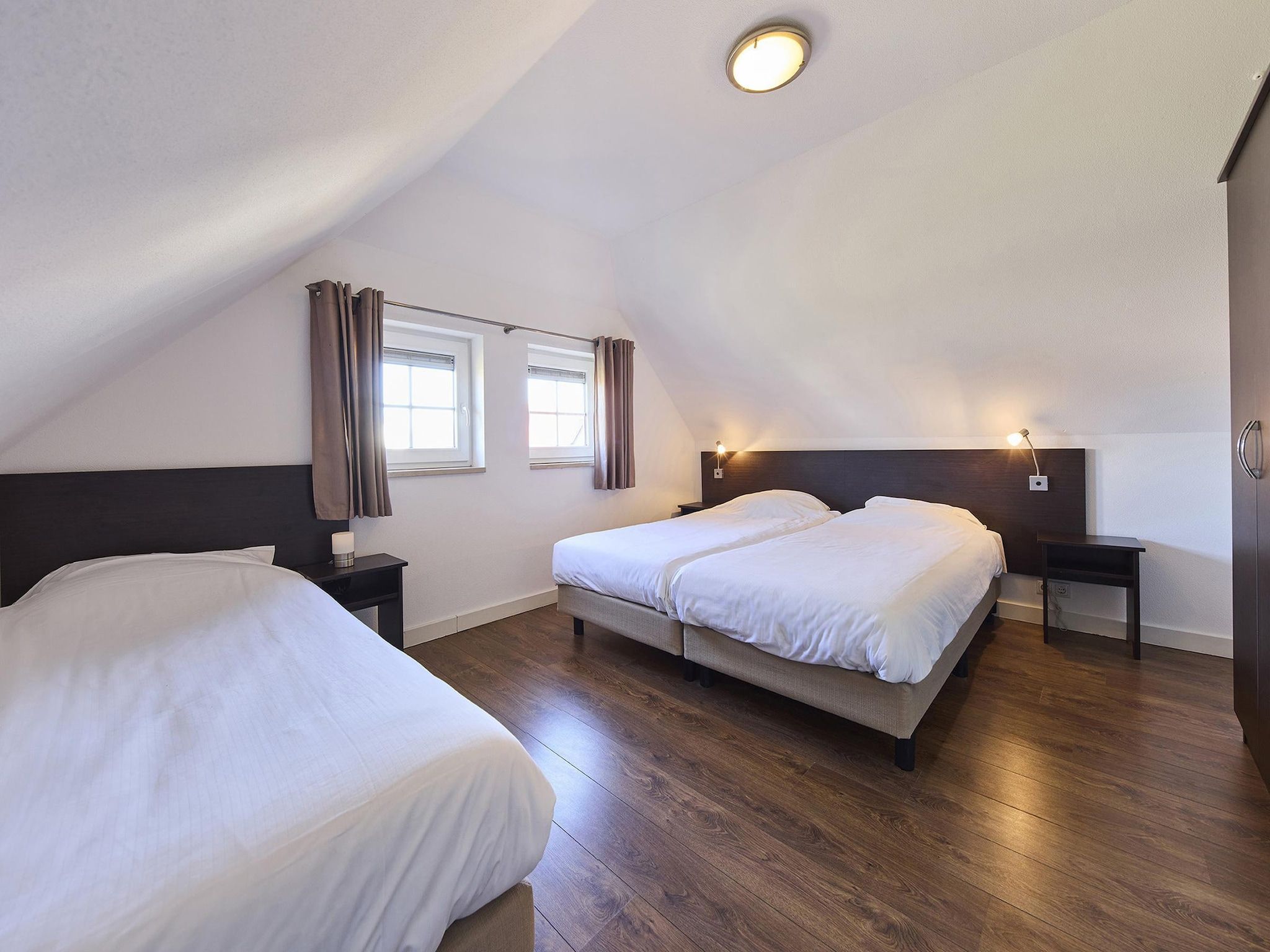 Een slaapkamer van Buitenhof De Leistert 6 in Roggel