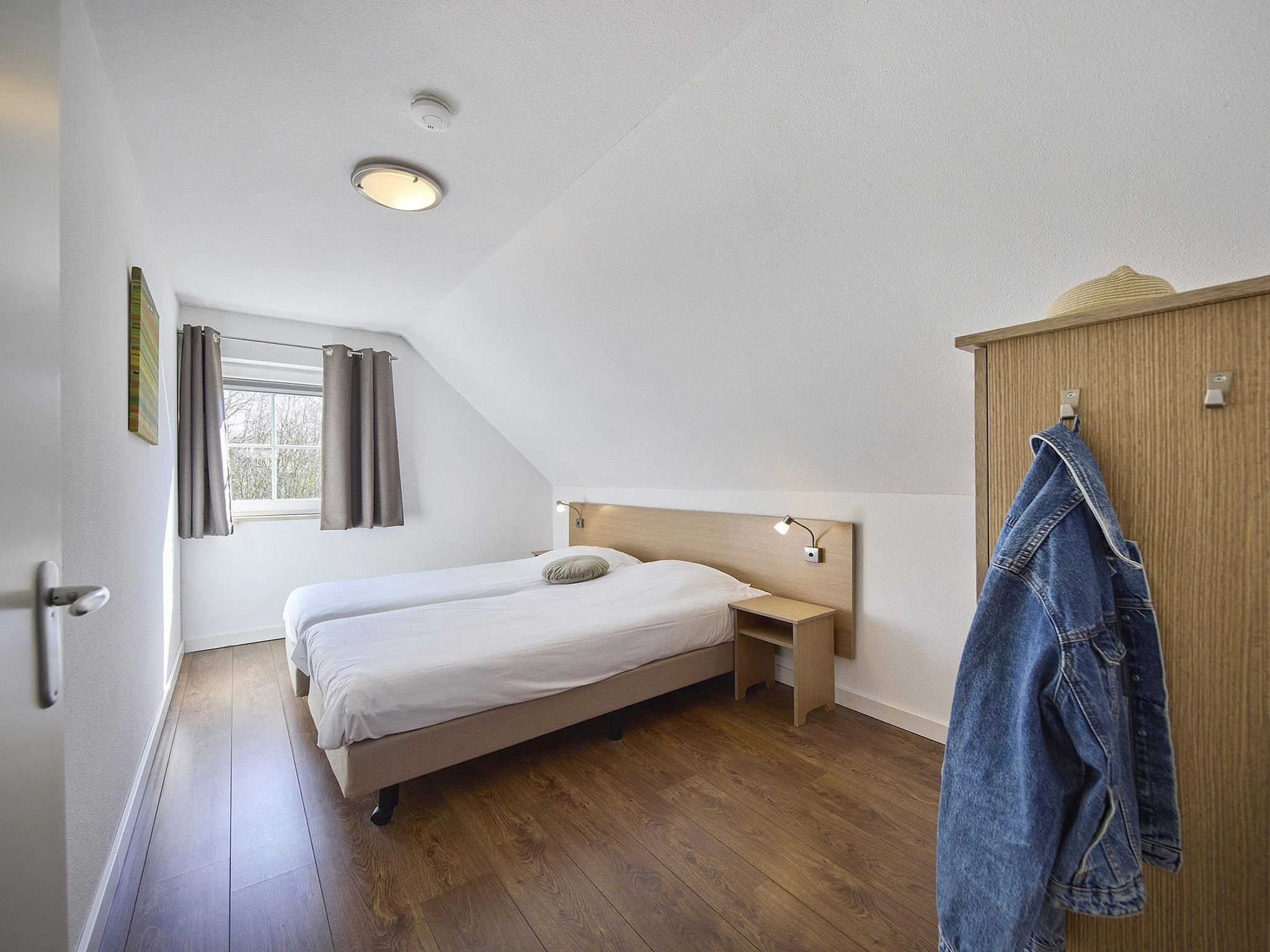 Een slaapkamer van Buitenhof De Leistert 13 in Roggel