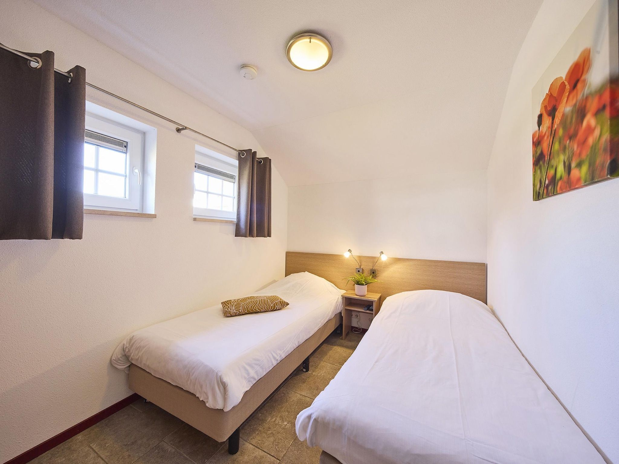 Een slaapkamer van Buitenhof De Leistert 12 in Roggel