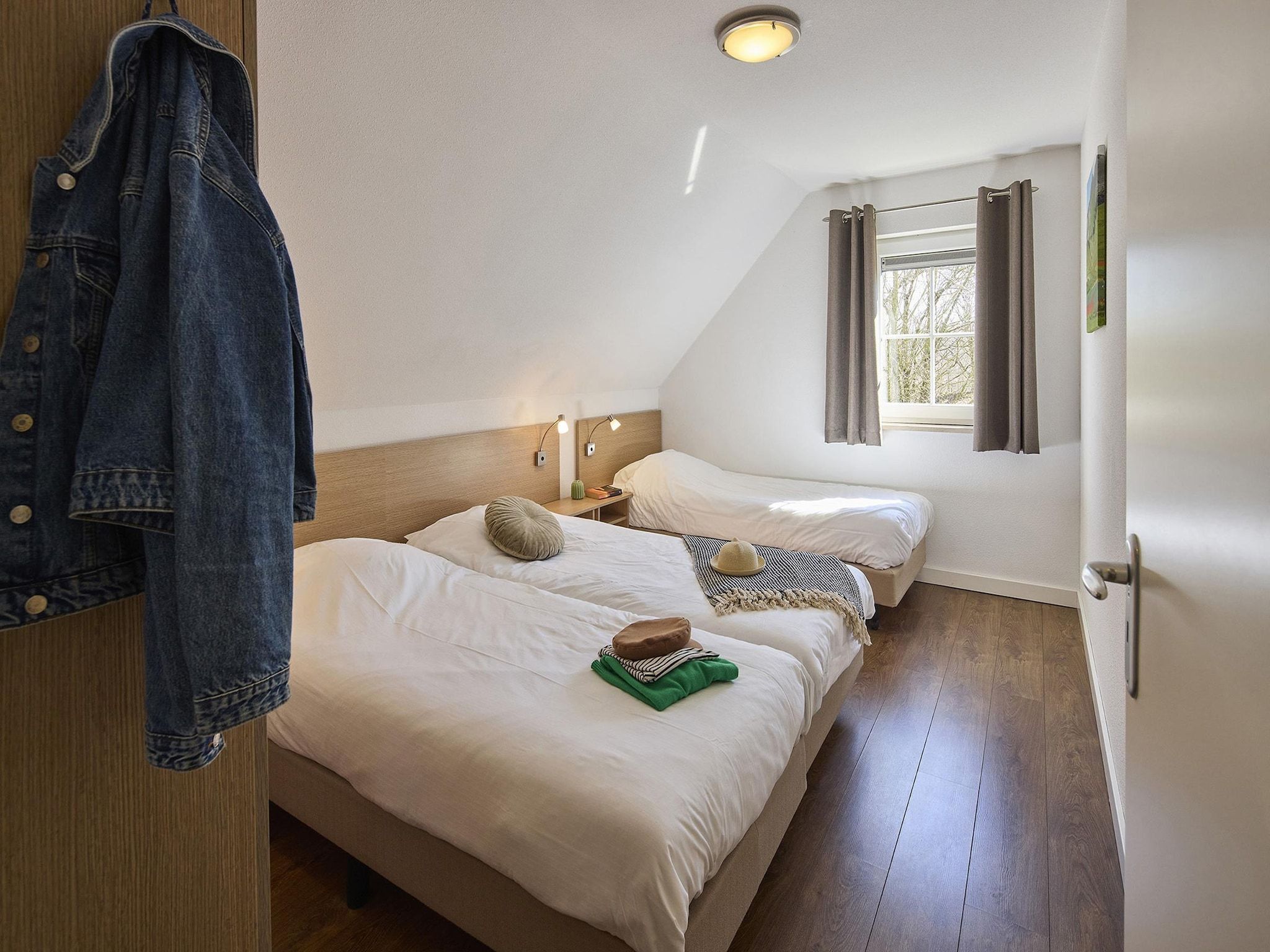 Een slaapkamer van Buitenhof De Leistert 9 in Roggel