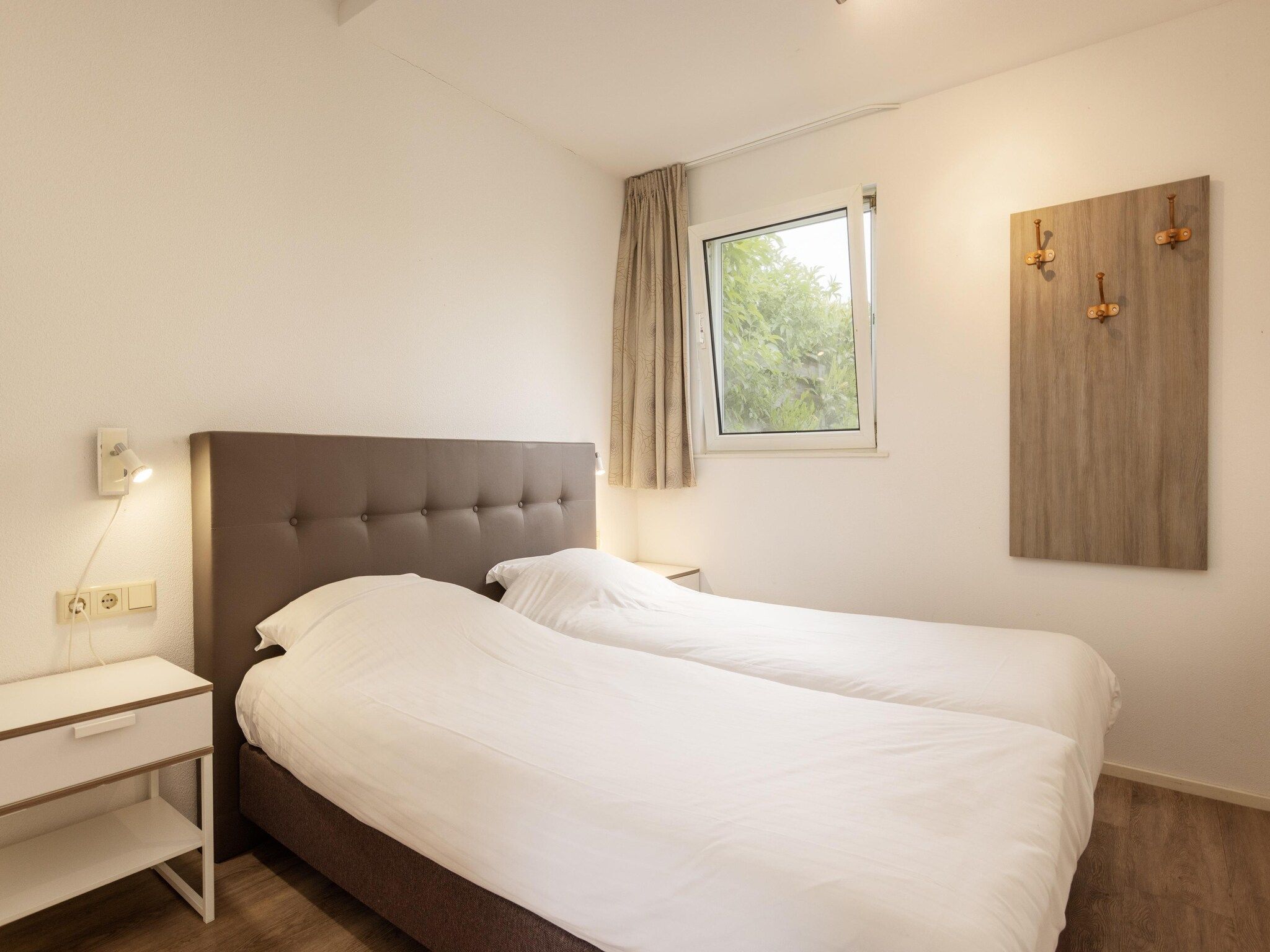 Een slaapkamer van Buitenplaats It Wiid 1 in Eernewoud