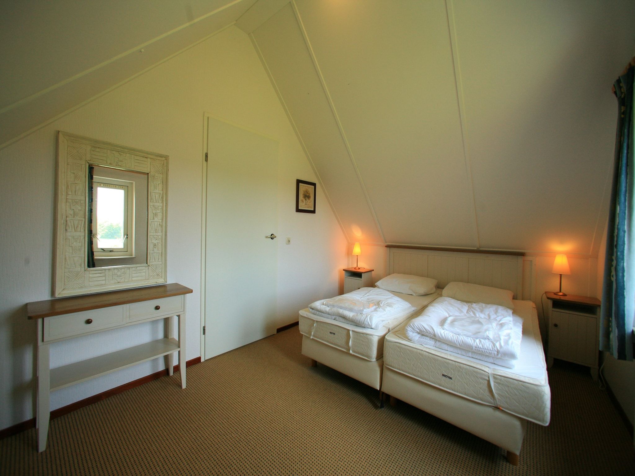 Een slaapkamer van Villapark Akenveen 2 in Tynaarlo