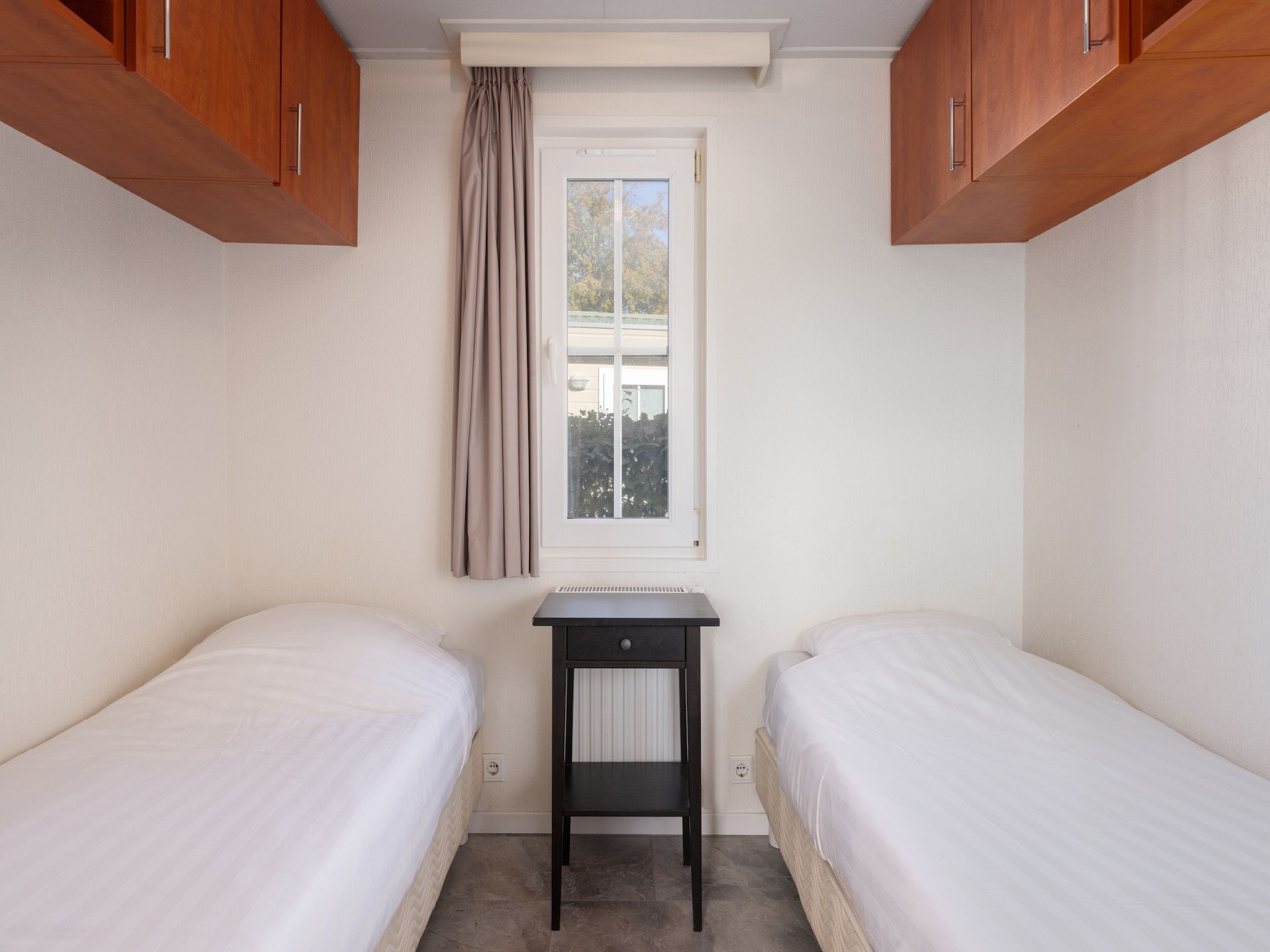 Een slaapkamer van Recreatiepark Tolplas 7 in Hoge Hexel