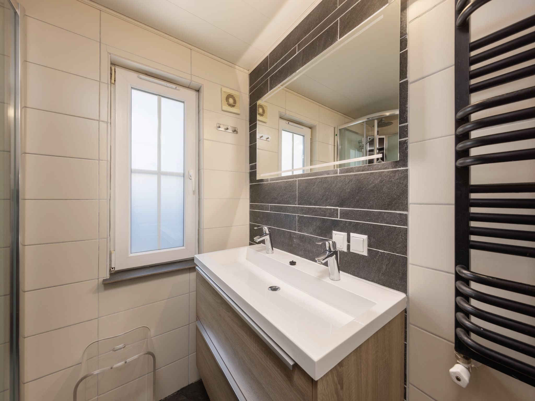 De badkamer van Recreatiepark Tolplas 7 in Hoge Hexel