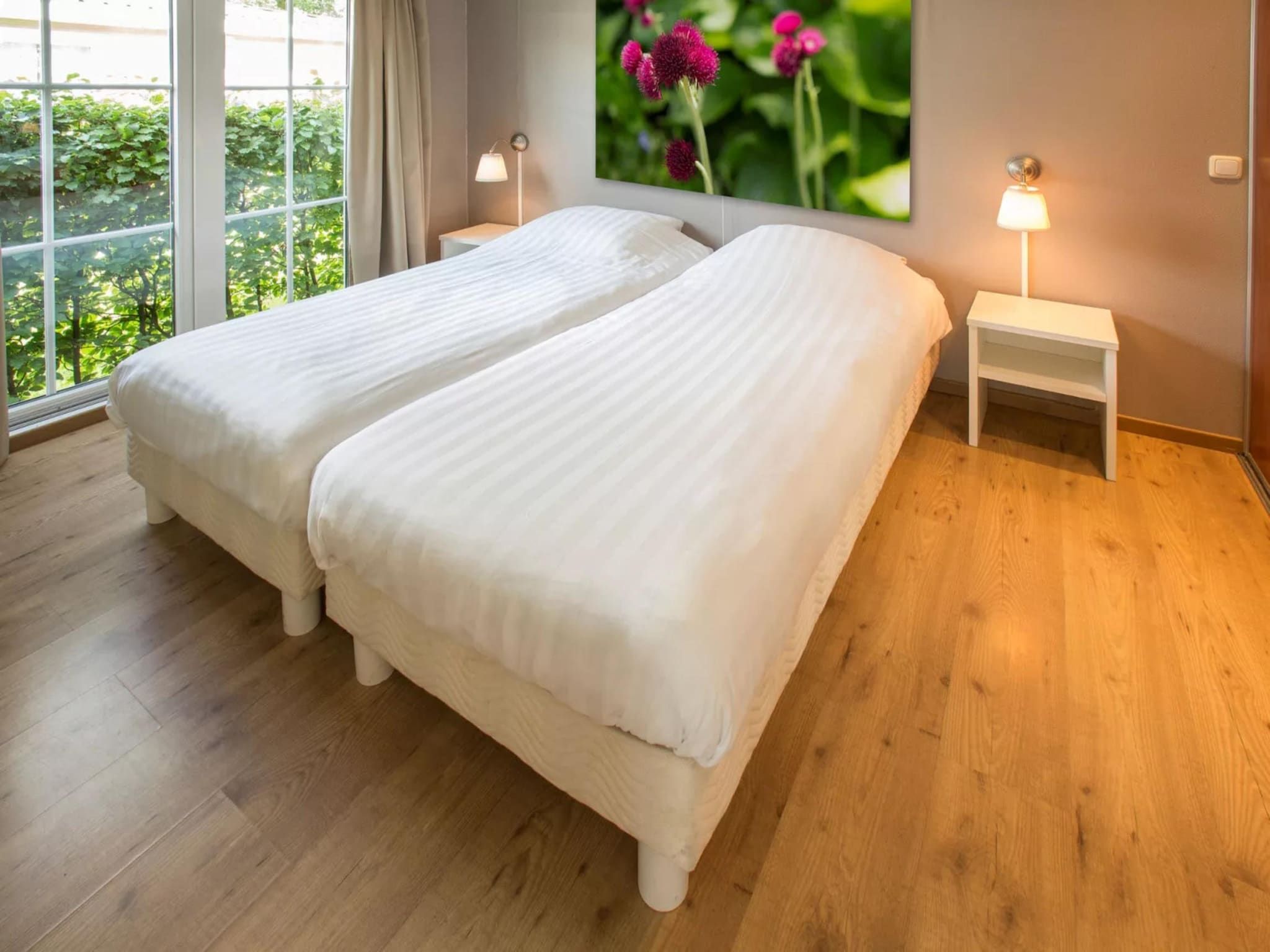 Een slaapkamer van Recreatiepark Tolplas 7 in Hoge Hexel