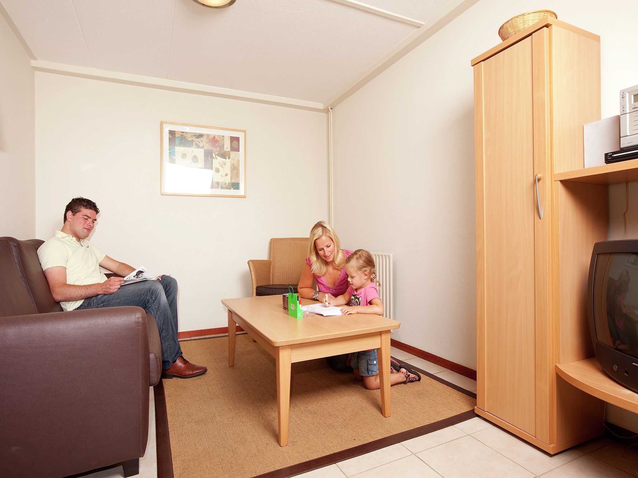 De woonkamer van Vakantiepark de Berkenhorst 5 in Kootwijk