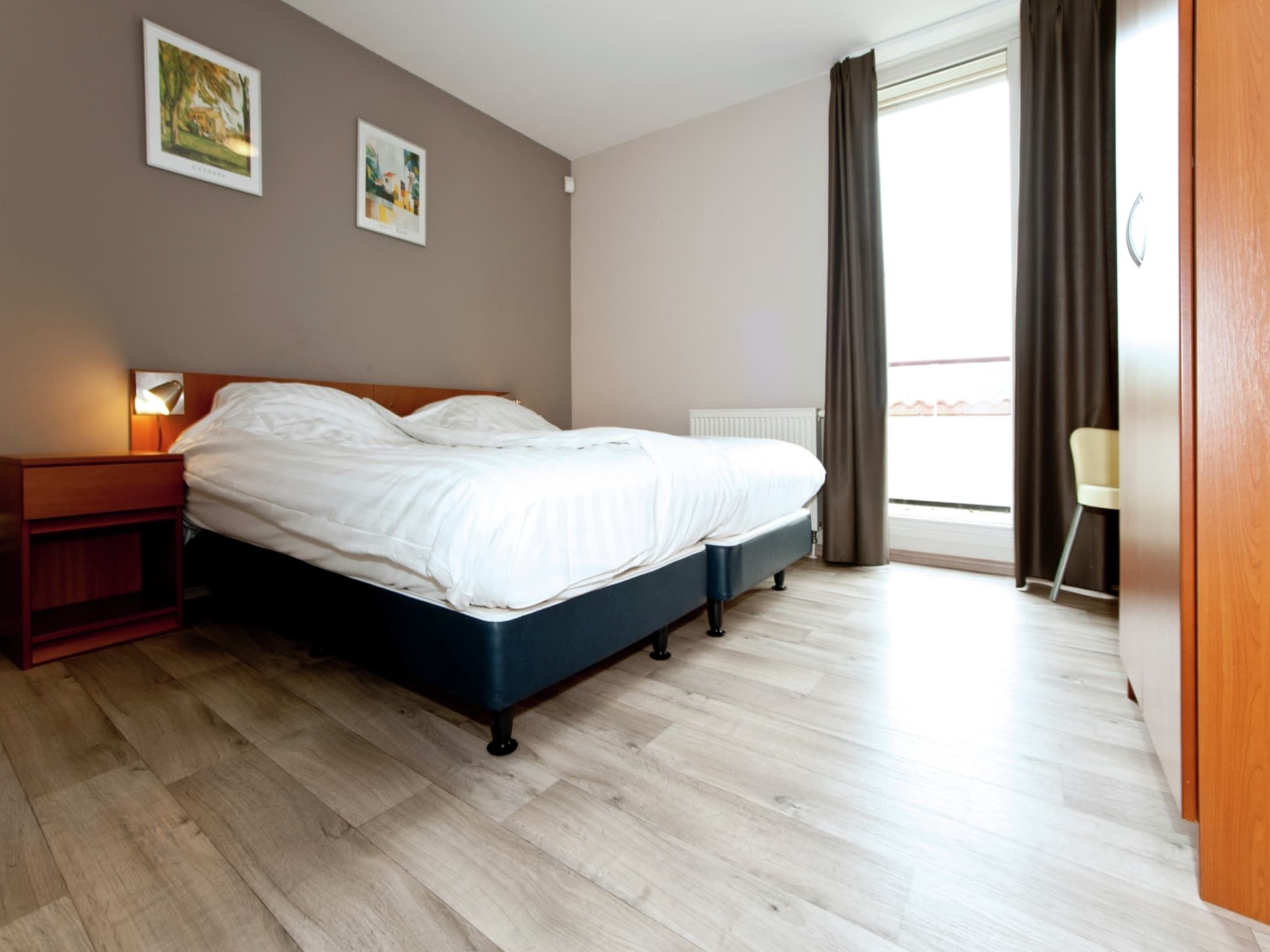 Een slaapkamer van Havenwoning 2-6 persoons in Heel