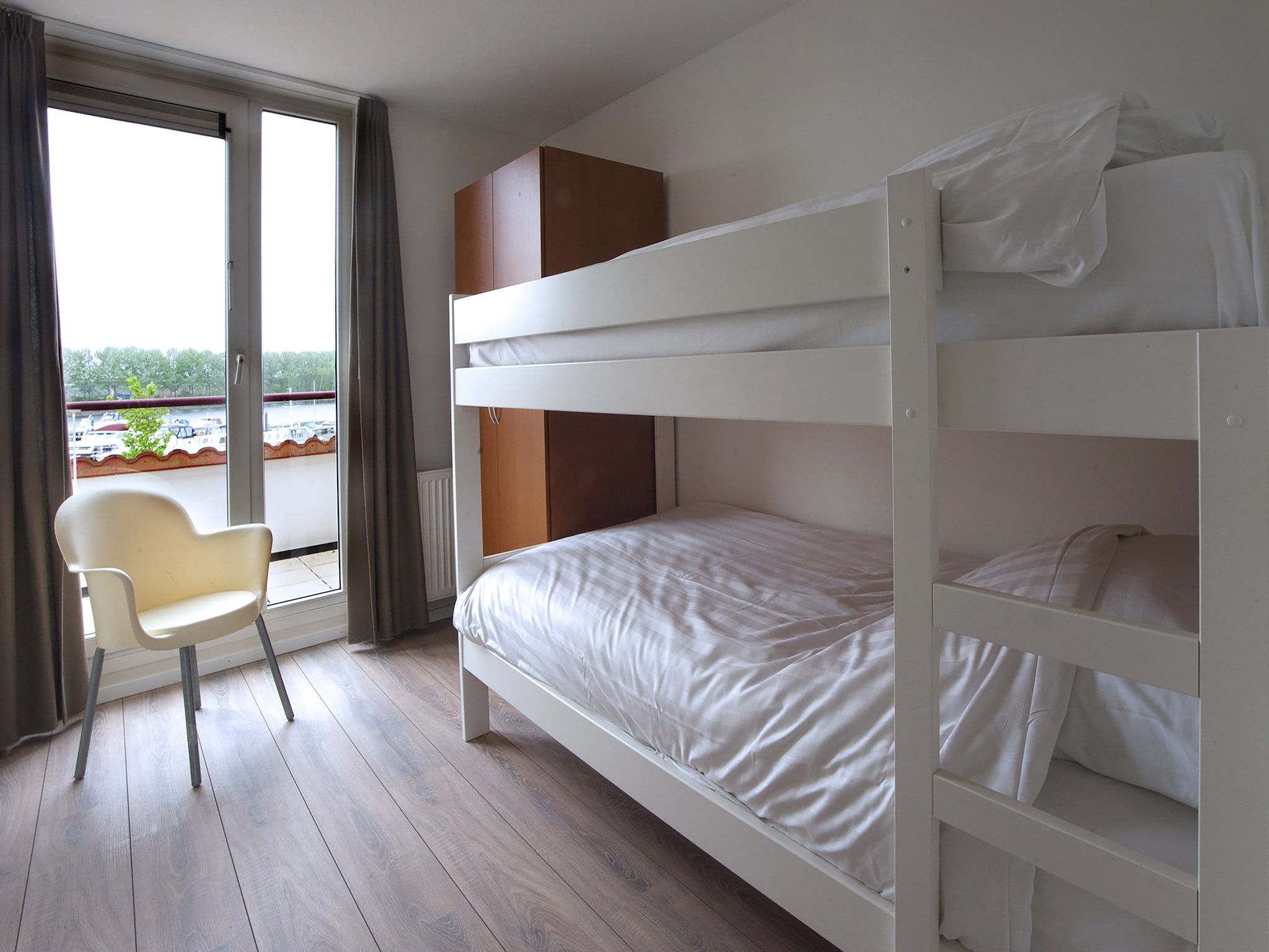 Een slaapkamer van Havenwoning 2-6 persoons in Heel