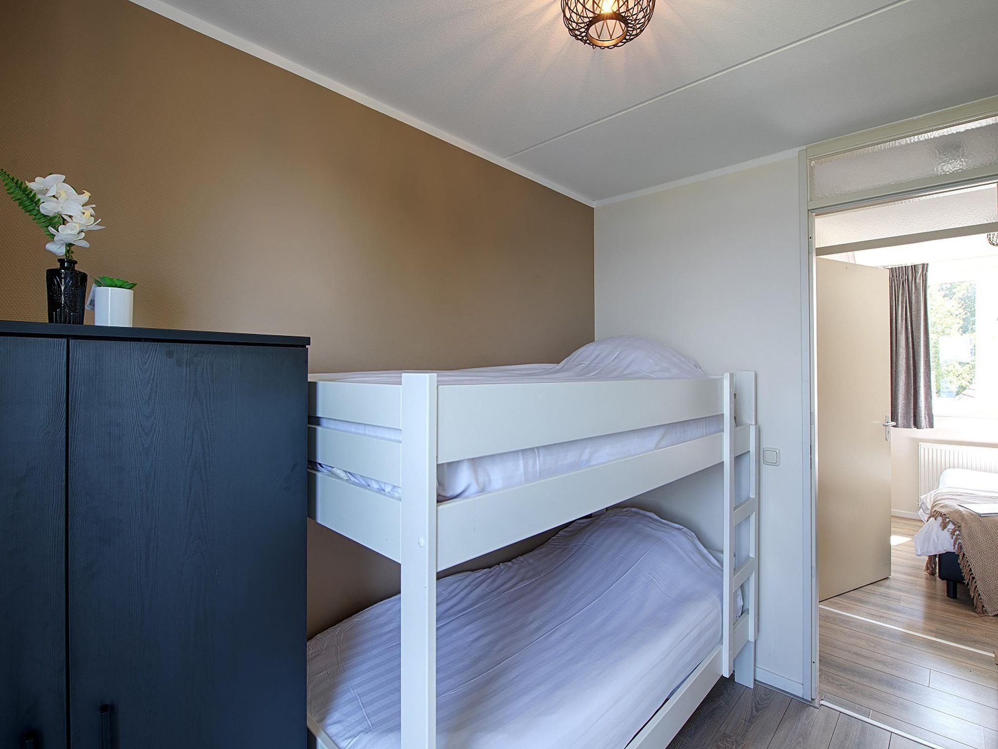 Een slaapkamer van Waterwoning 2-6 persoons in Heel