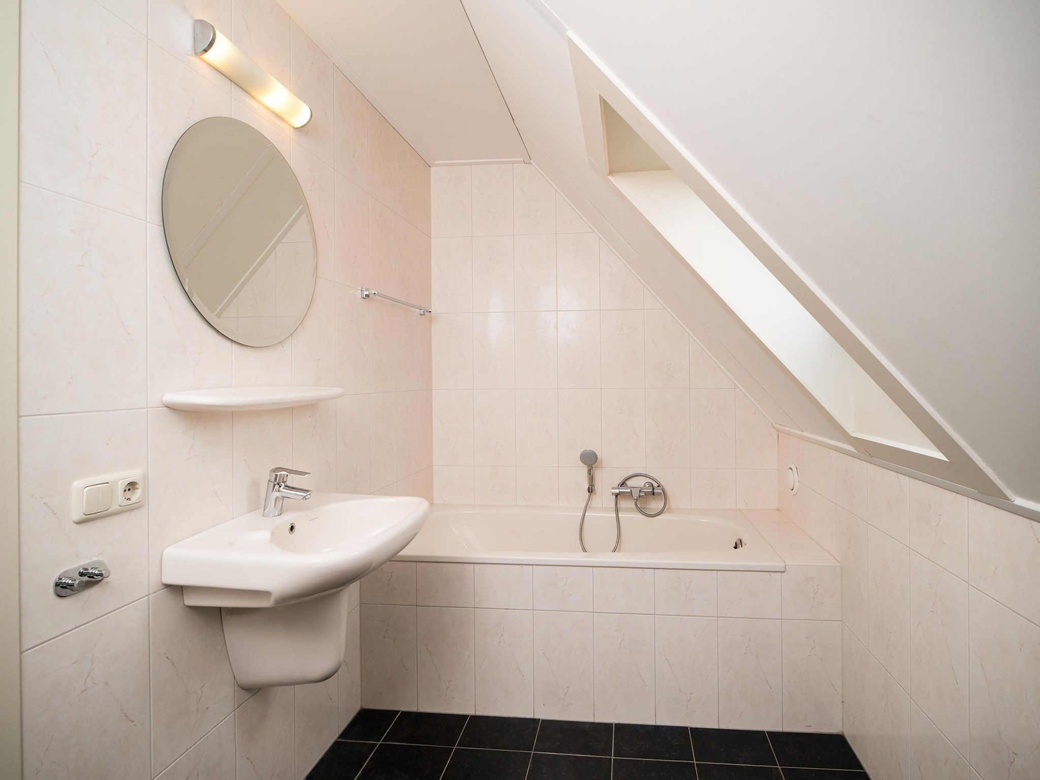 De badkamer van Venwoning 2-6 persoons in Heel