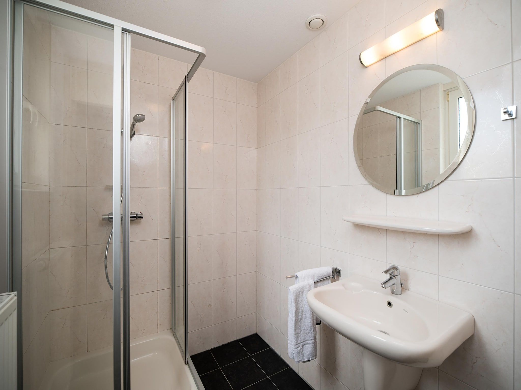 De badkamer van Venwoning 2-6 persoons in Heel