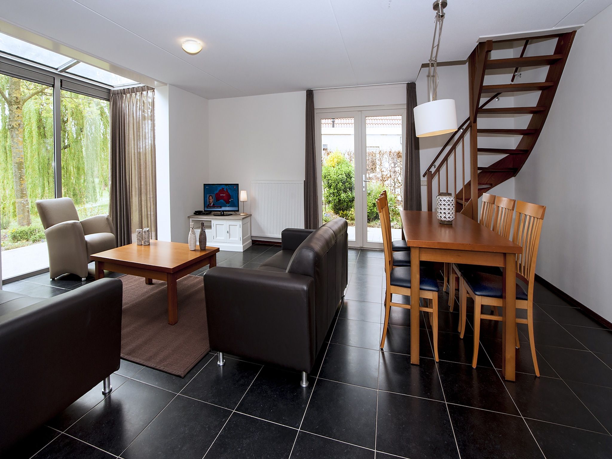 De woonkamer van Venwoning 2-6 persoons in Heel