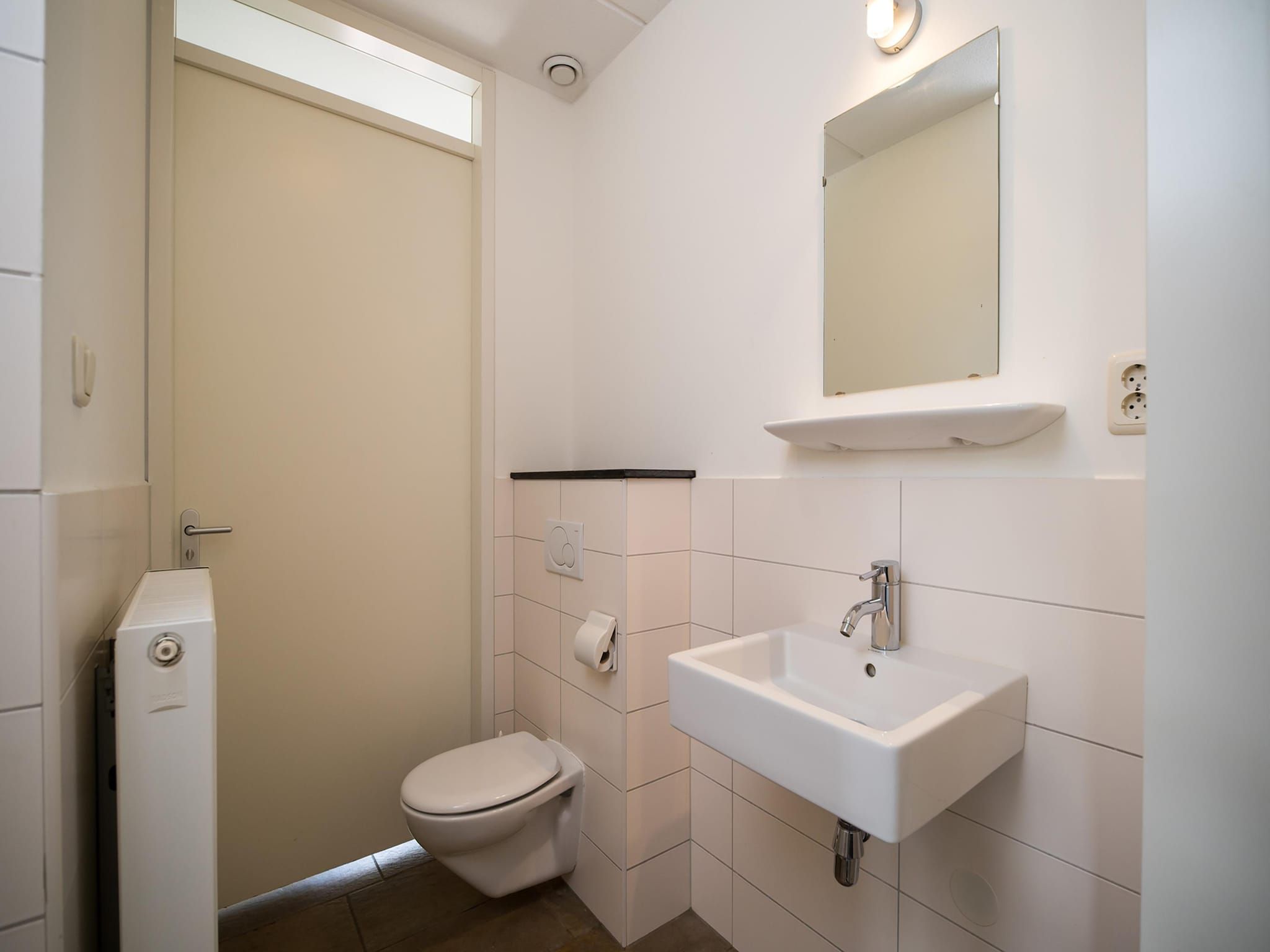 De badkamer van Tuinvilla 2-6 persoons in Heel