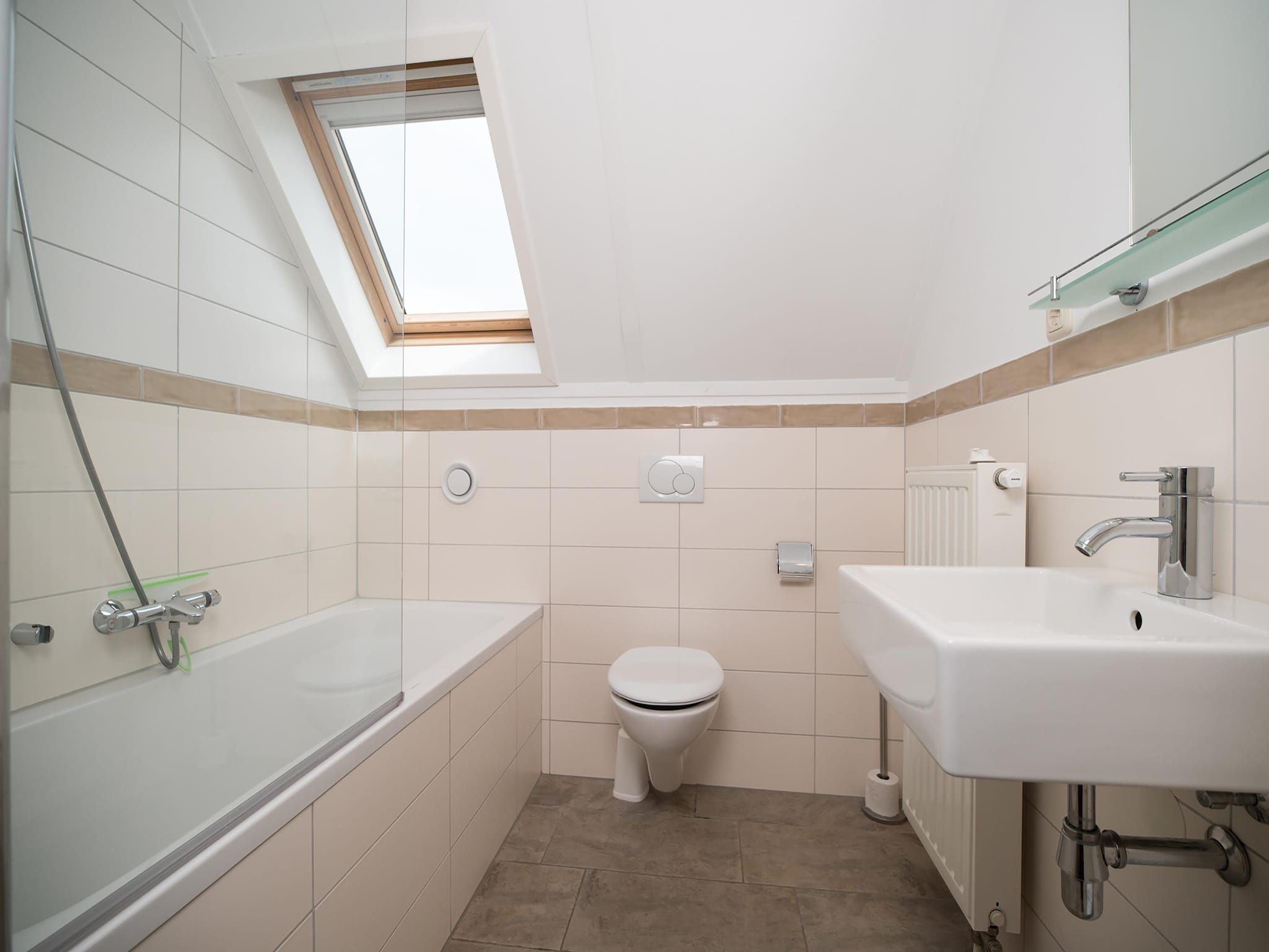 De badkamer van Tuinvilla 2-6 persoons in Heel