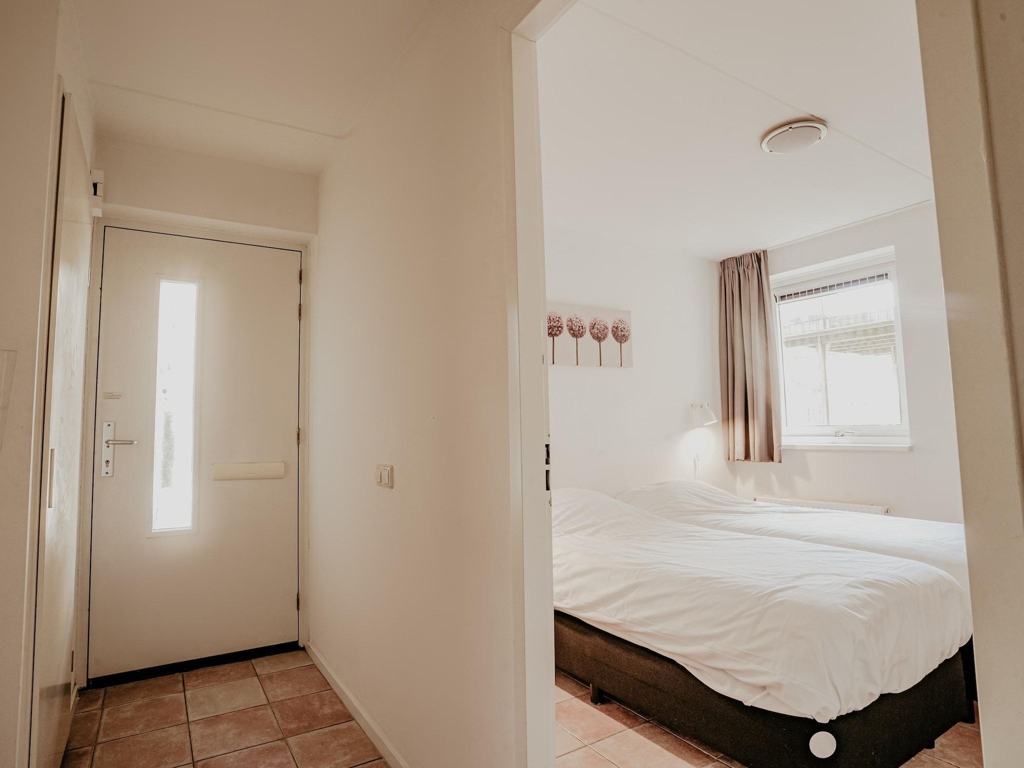 Een slaapkamer van Waterpark de Meerparel 7 in Uitgeest