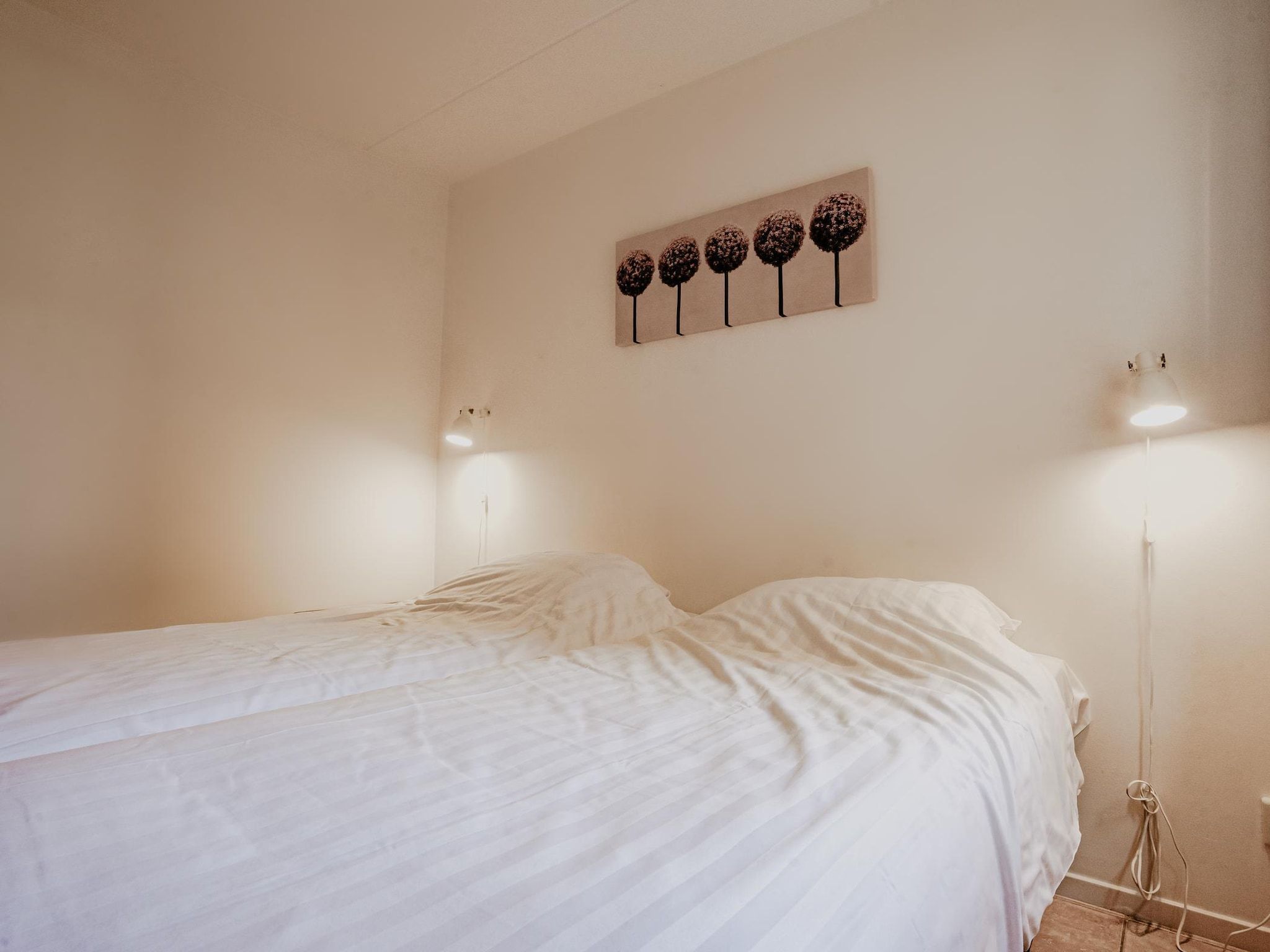 Een slaapkamer van Waterpark de Meerparel 7 in Uitgeest