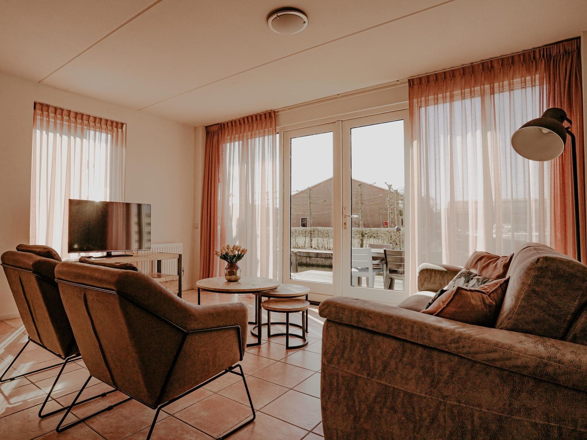 De woonkamer van Waterpark de Meerparel 7 in Uitgeest