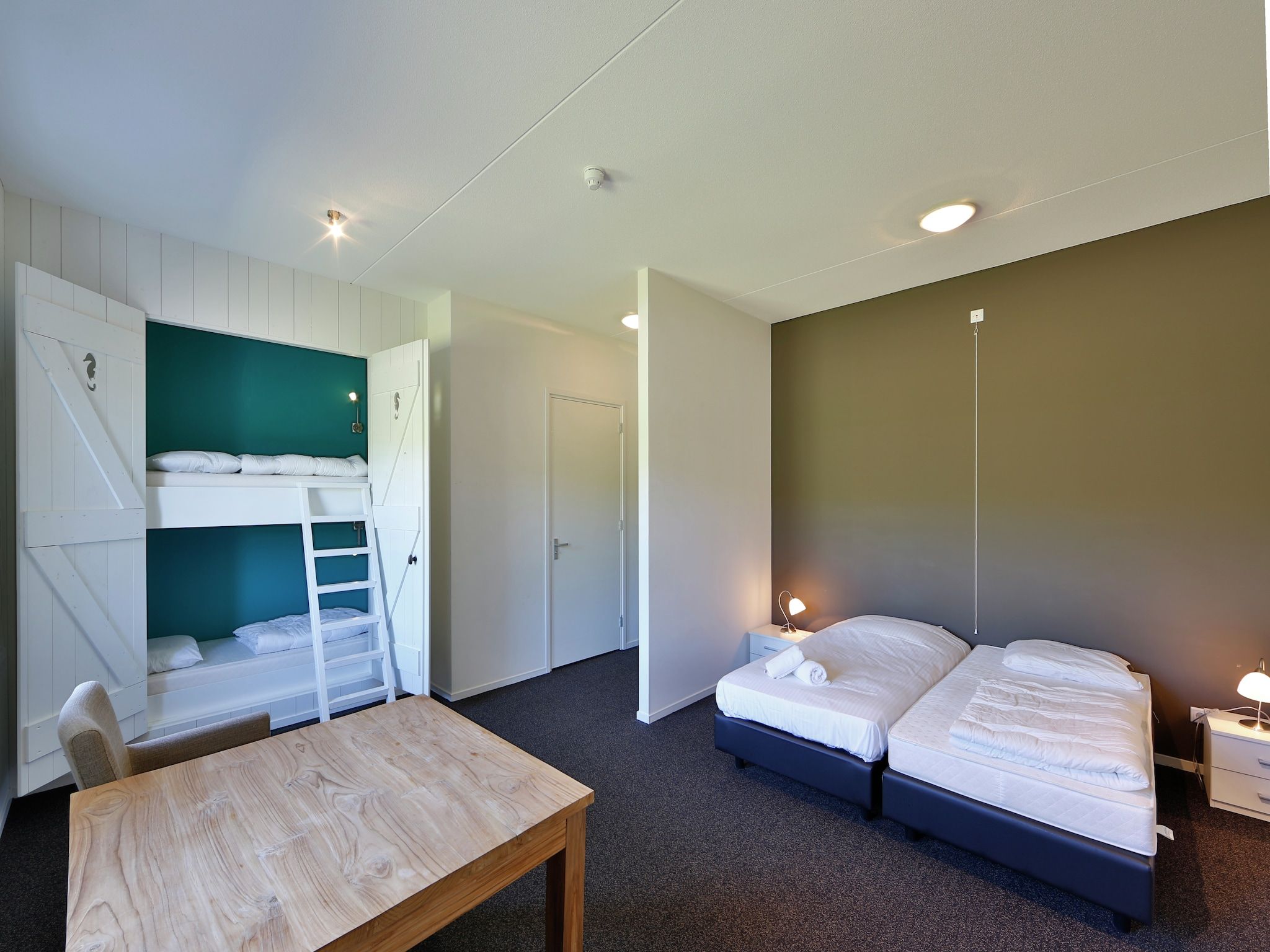 Een slaapkamer van Recreatiepark de Stelhoeve 2 in Wemeldinge