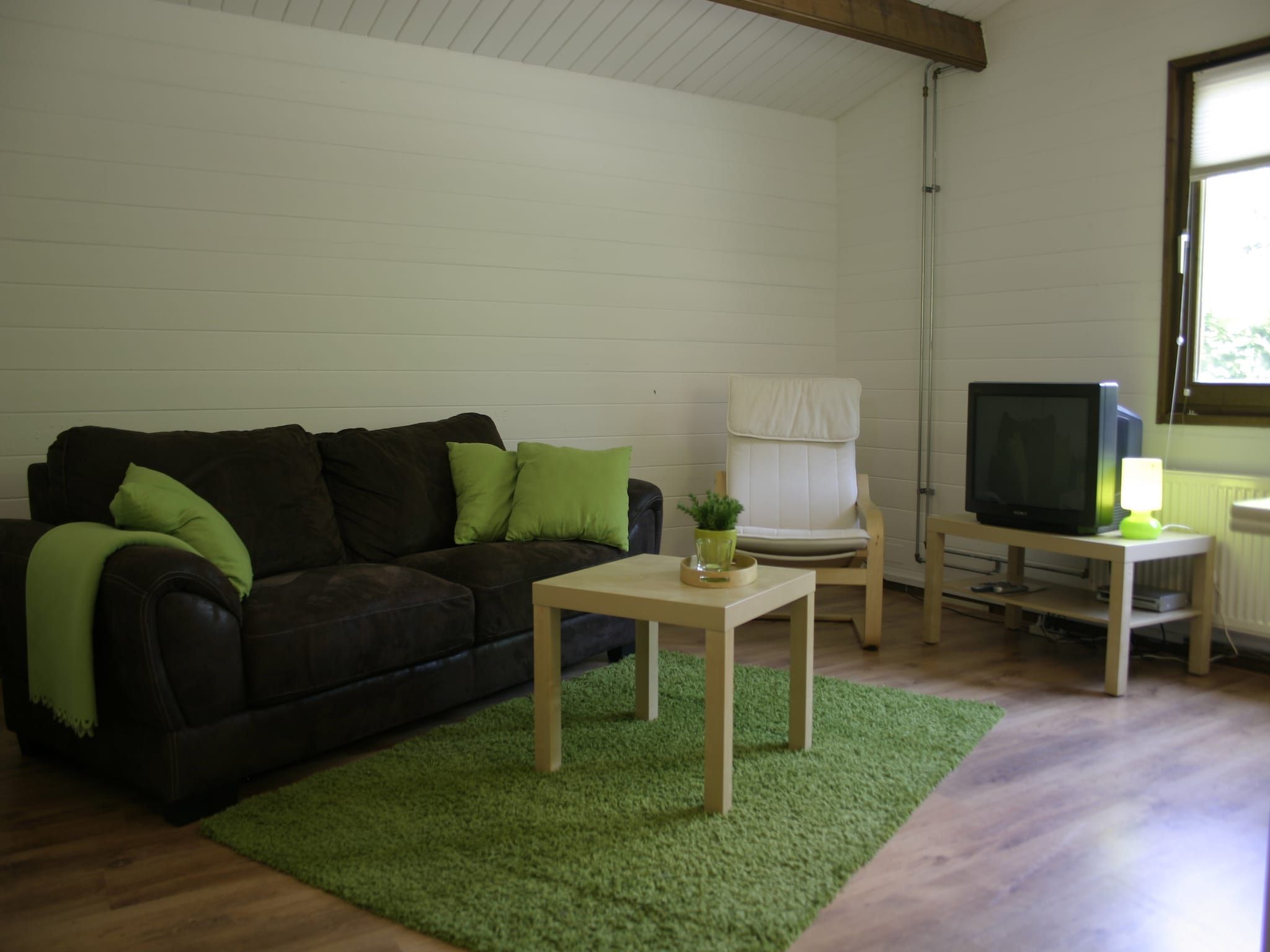 De woonkamer van Chaletpark Kuiperberg 1 in Ootmarsum