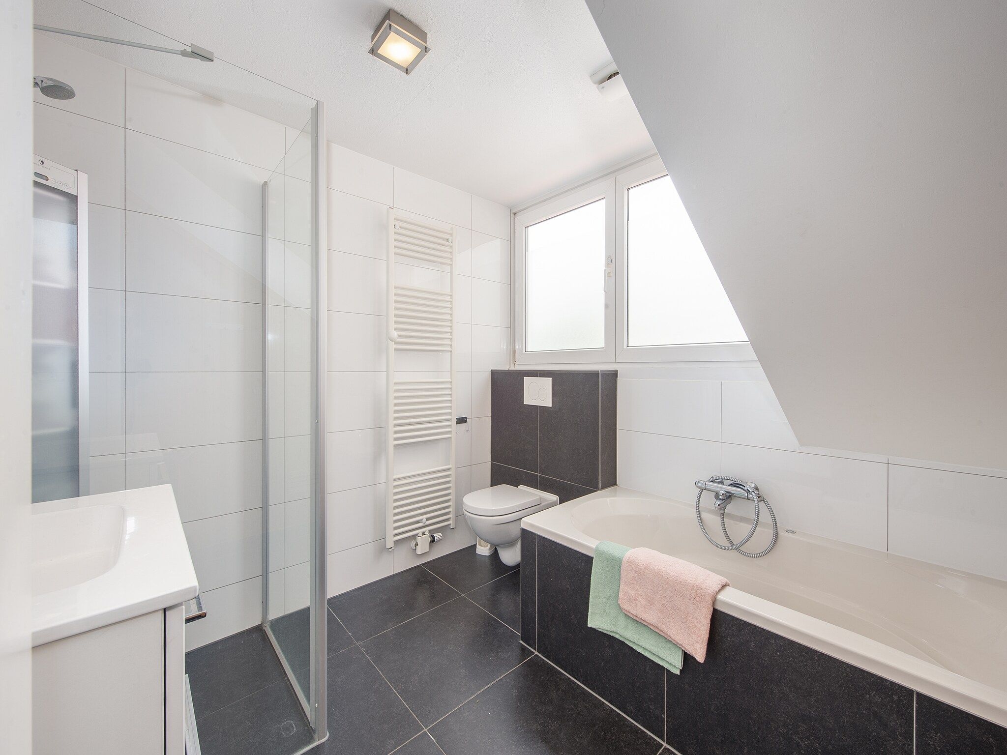 De badkamer van Resort Arcen 12 in Arcen