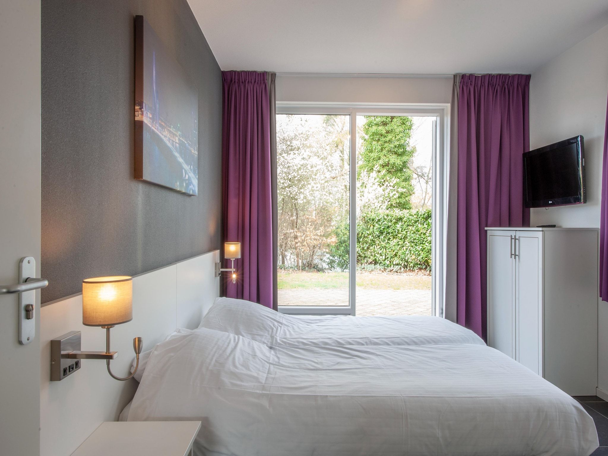 Een slaapkamer van Resort Arcen 3 in Arcen