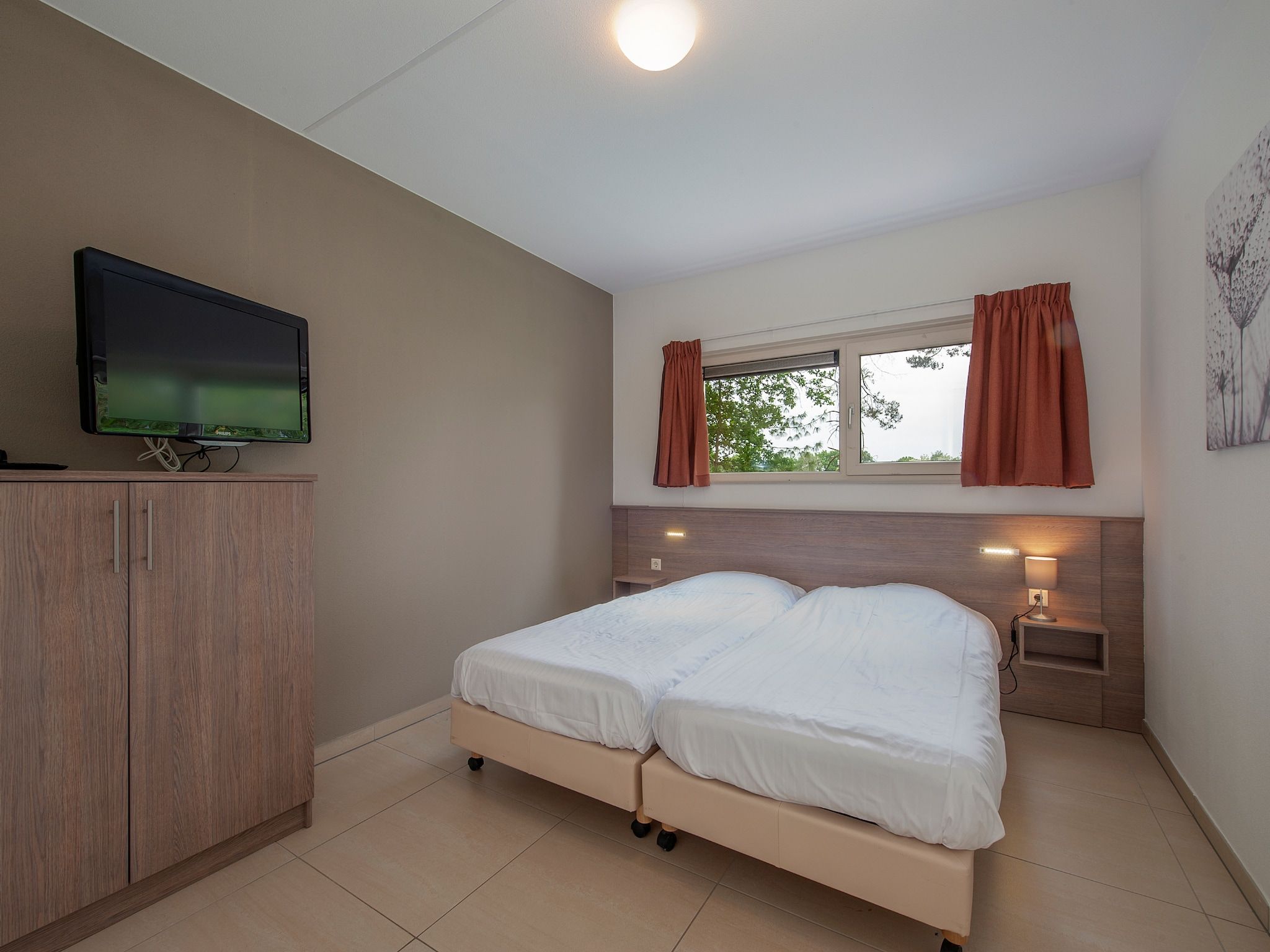 Een slaapkamer van Resort Arcen 8 in Arcen