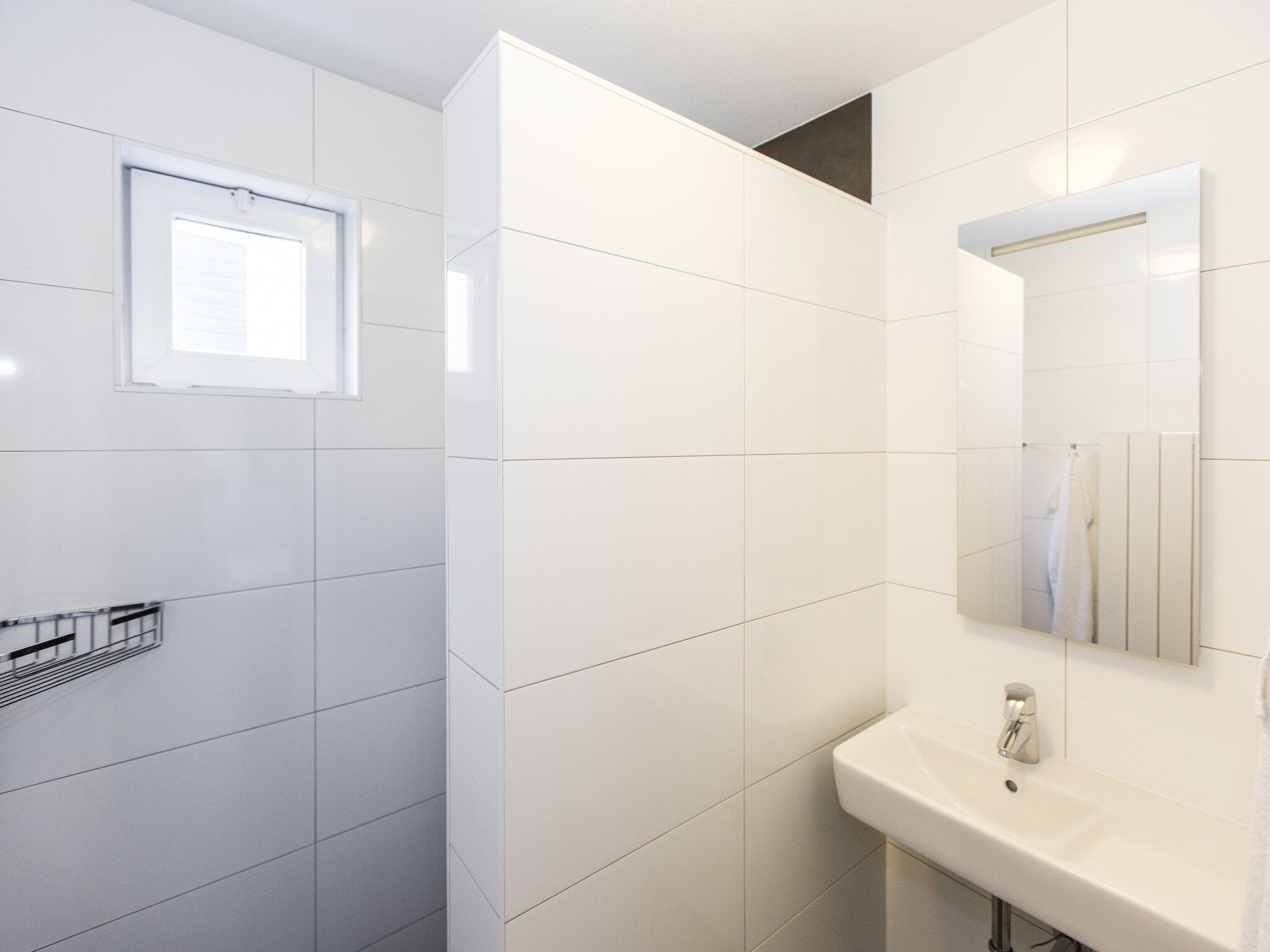 De badkamer van Resort Arcen 14 in Arcen