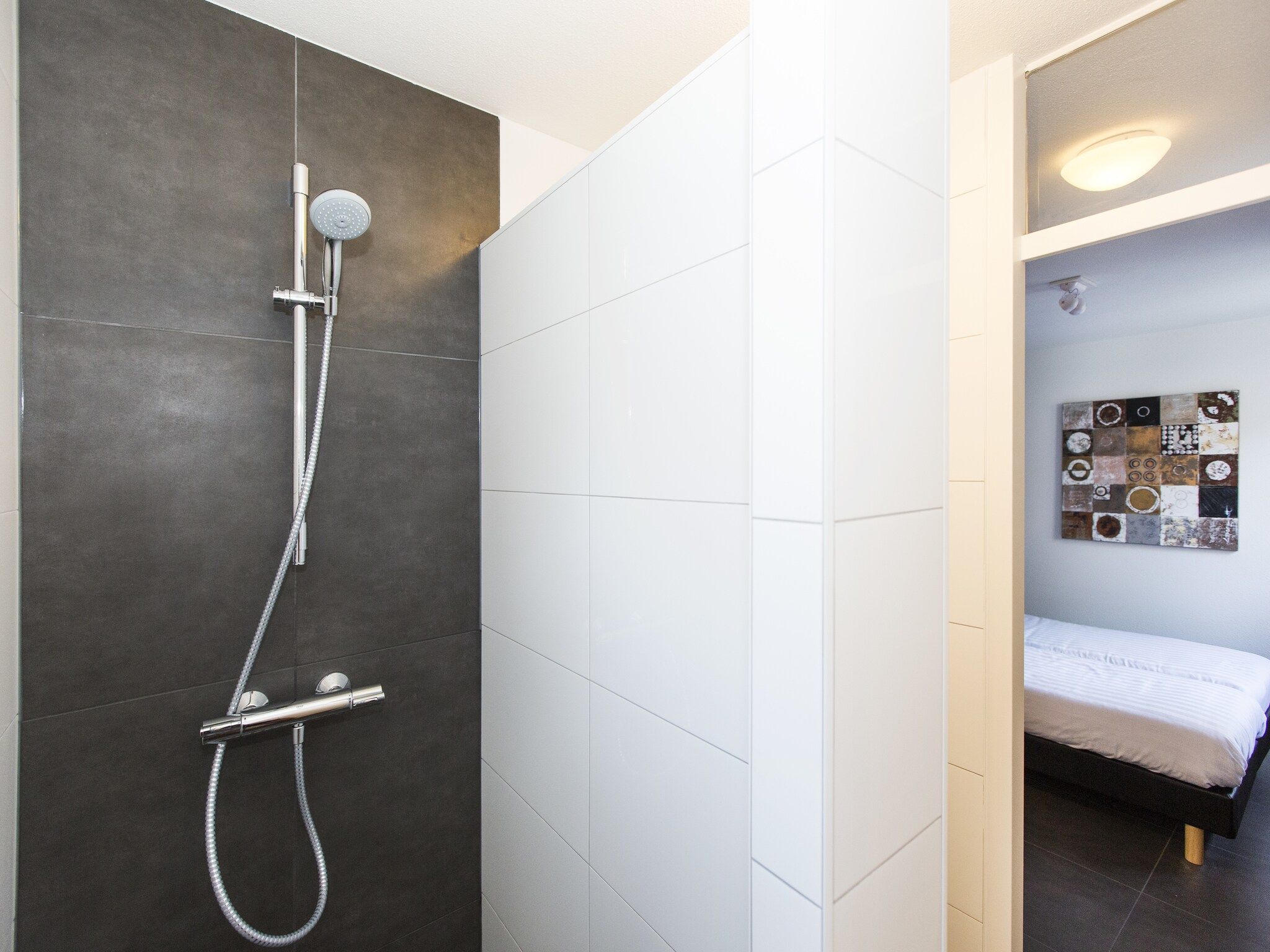 De badkamer van Resort Arcen 14 in Arcen