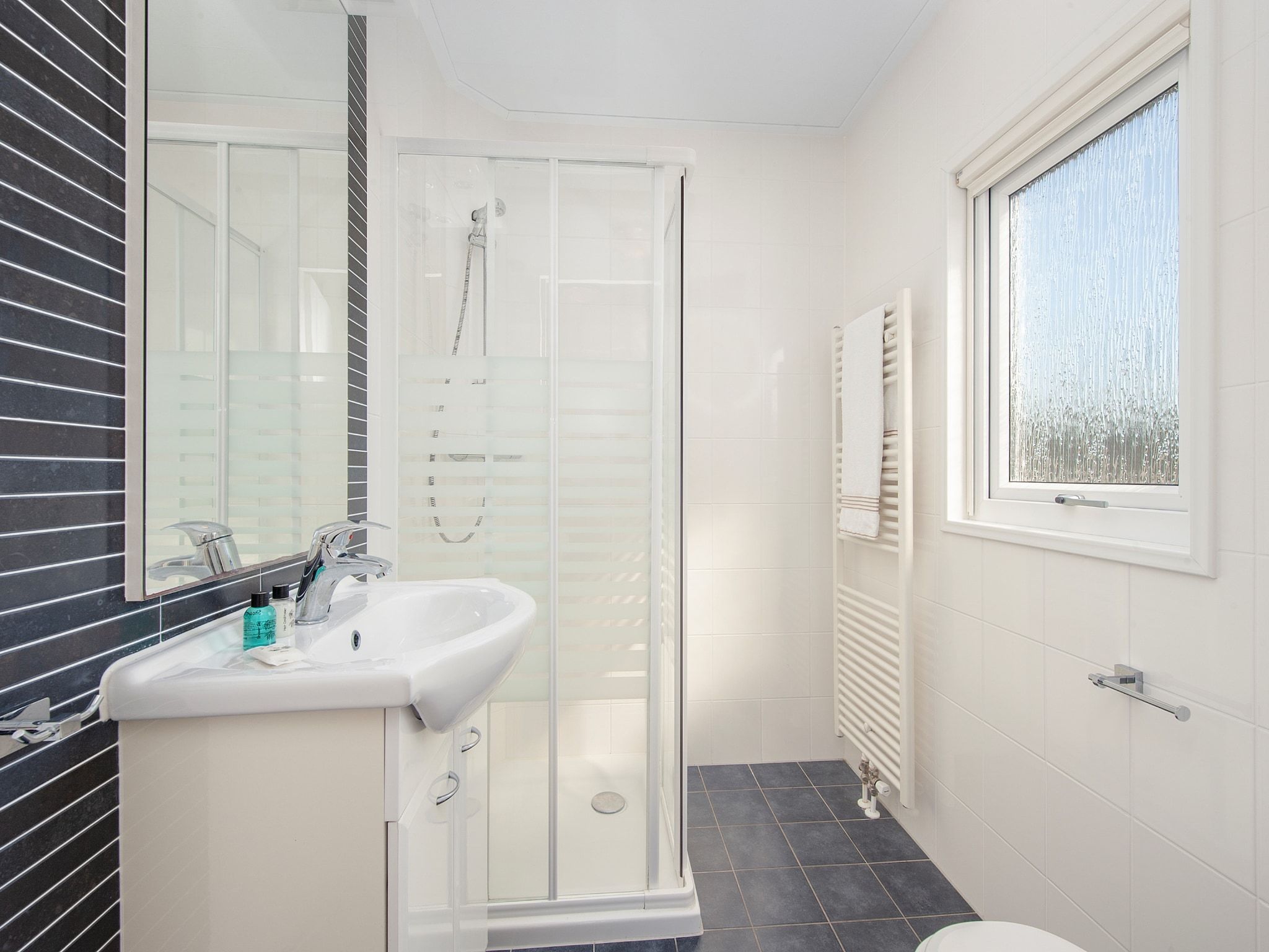 De badkamer van Vakantiepark Giethoorn 3 in Giethoorn