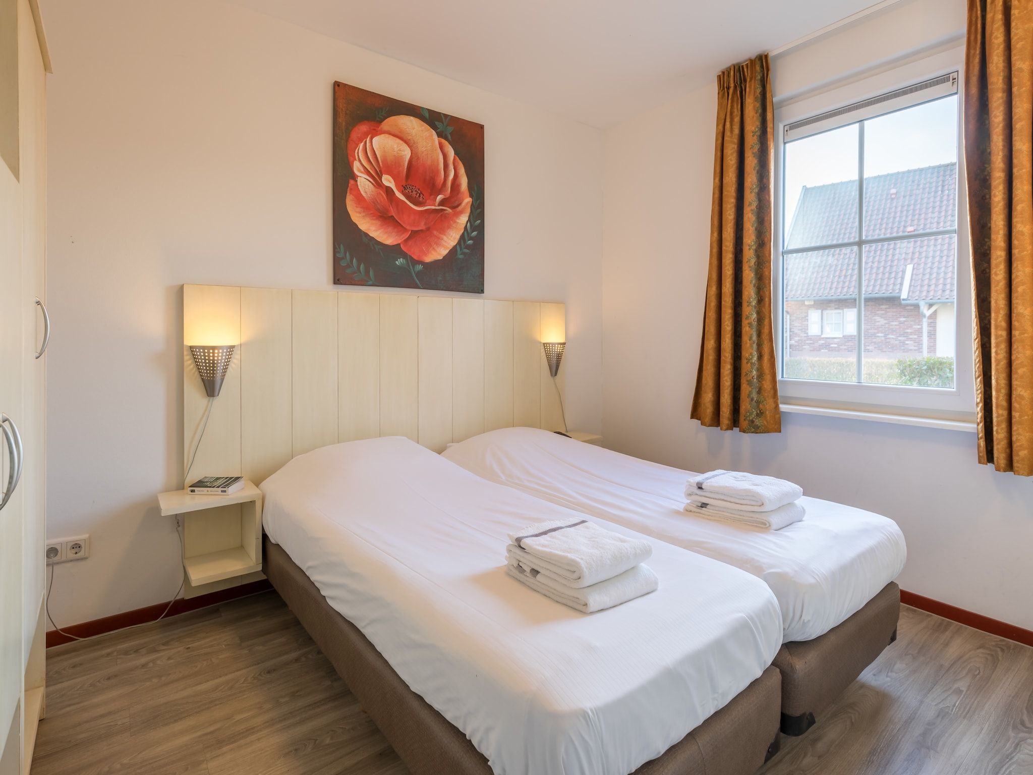 Een slaapkamer van Résidence Klein Vink 1 in Arcen