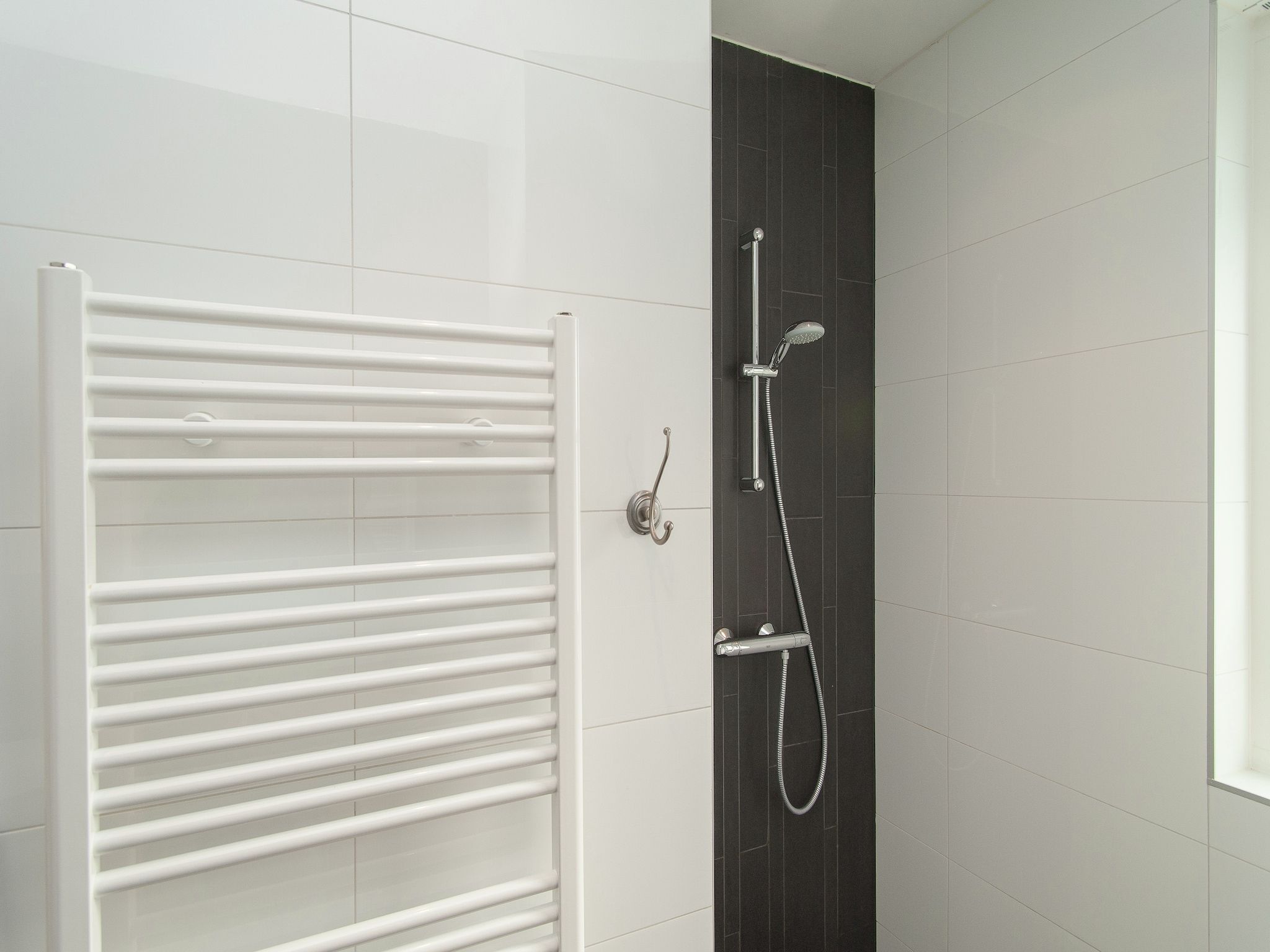 De badkamer van Bungalowpark de Gouden Spar 3 in Noordwijk