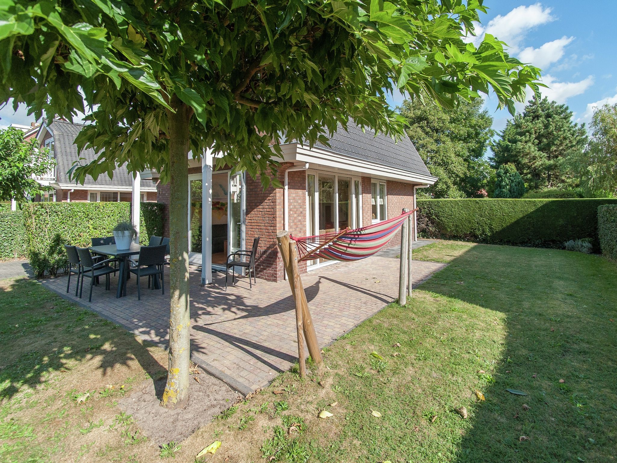 De tuin van Bungalowpark de Gouden Spar 4 in Noordwijk