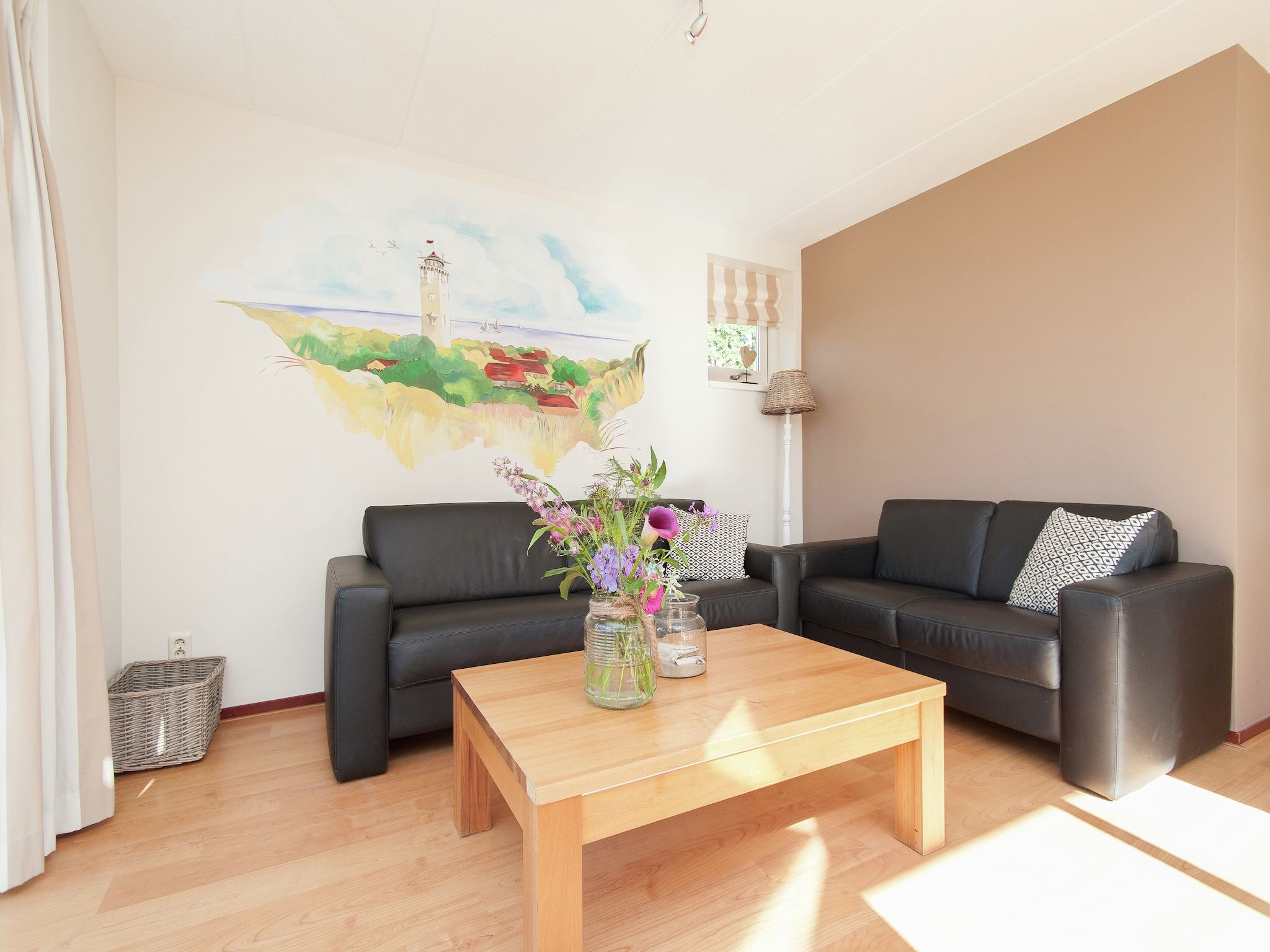 De woonkamer van Bungalowpark de Gouden Spar 4 in Noordwijk