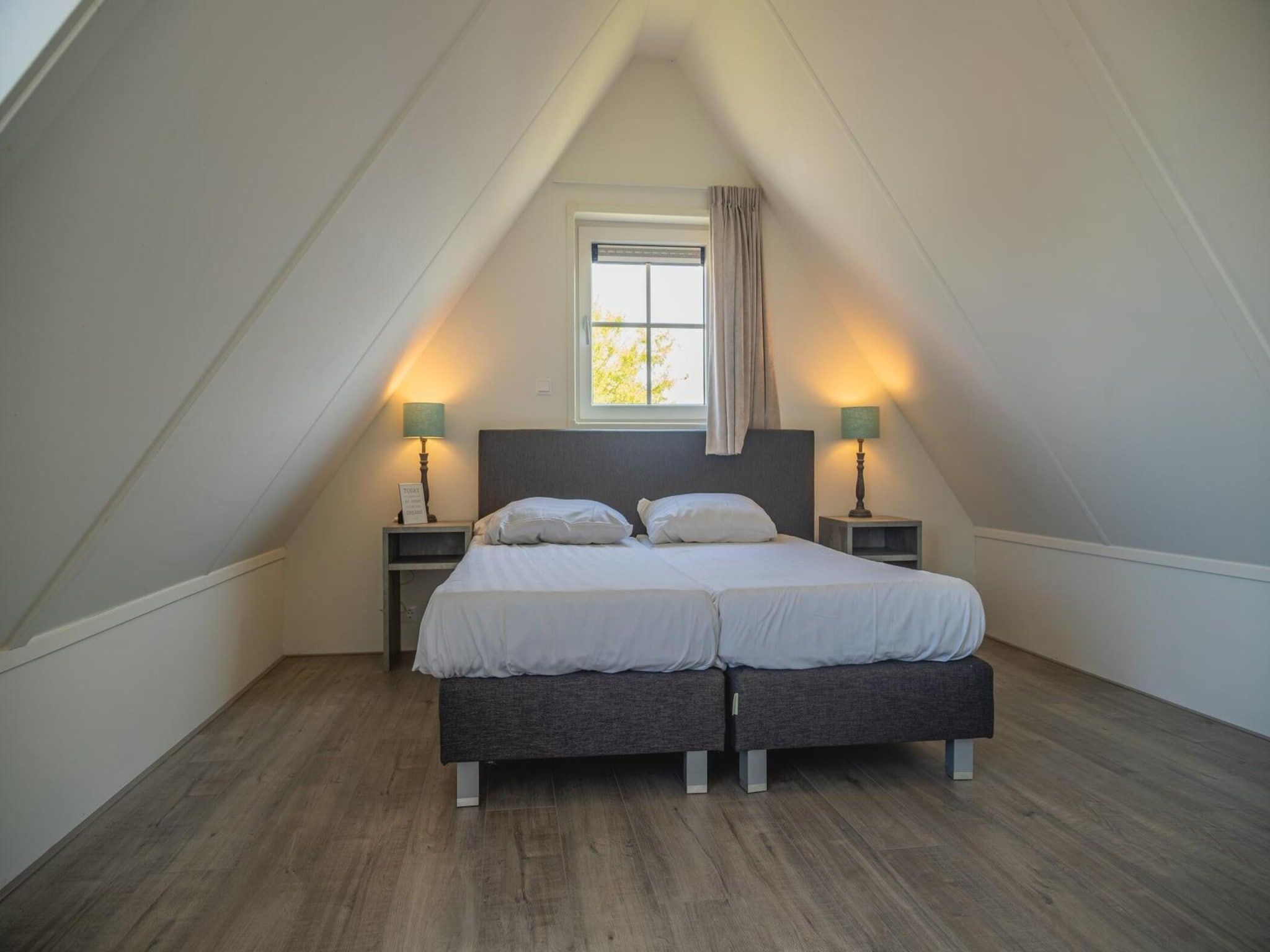 Een slaapkamer van Waterland  6 personen in West-Graftdijk