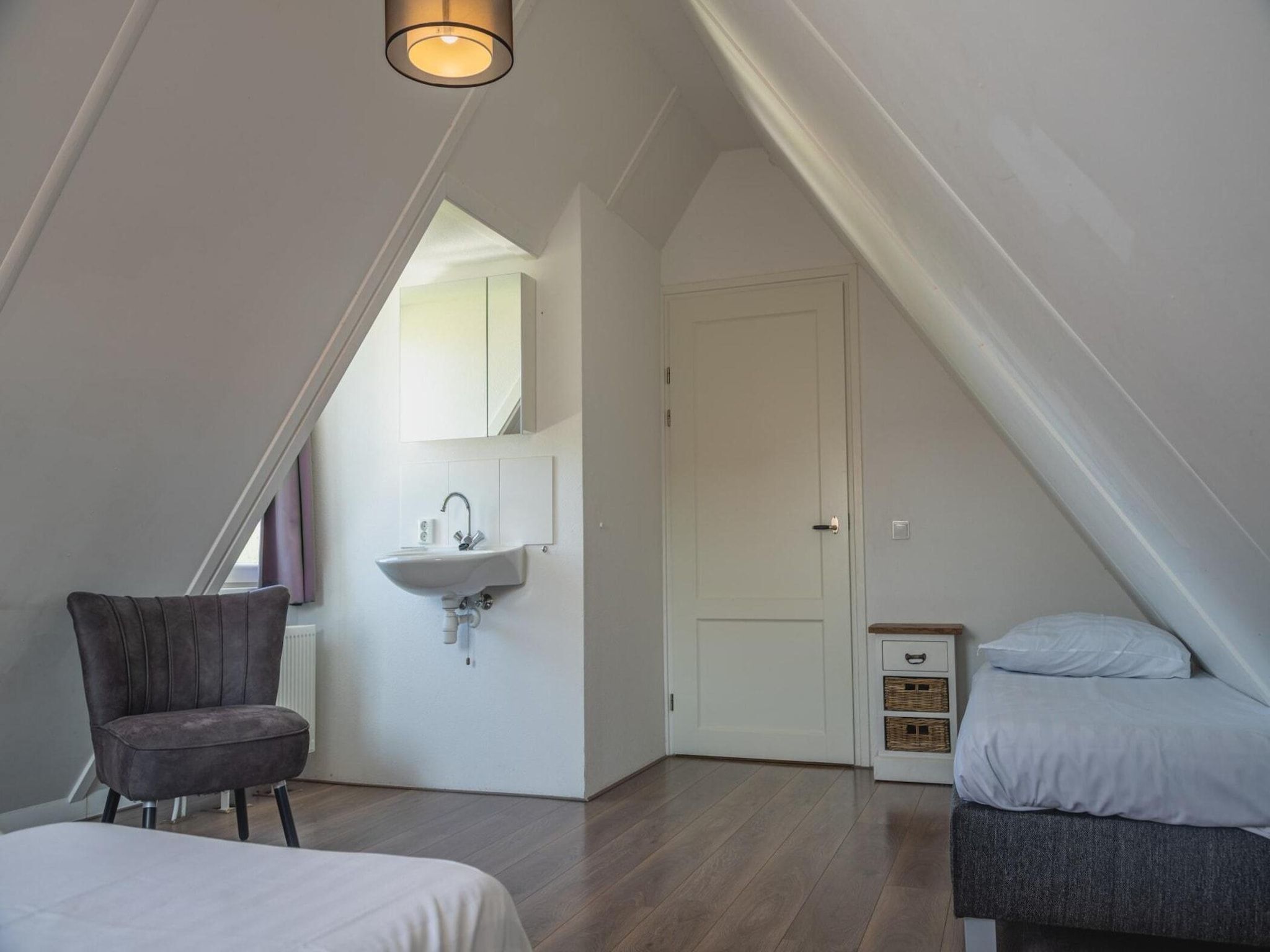 Een slaapkamer van 	Waterland  8 personen in West-Graftdijk