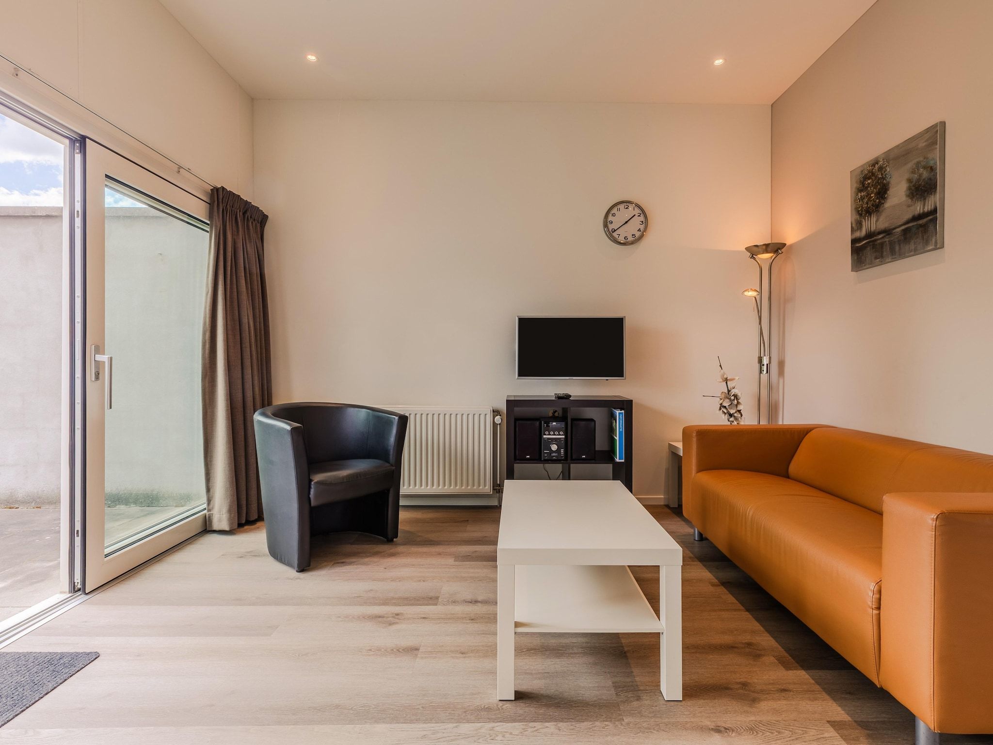 De woonkamer van Bungalowpark Schin op Geul 3 in Walem