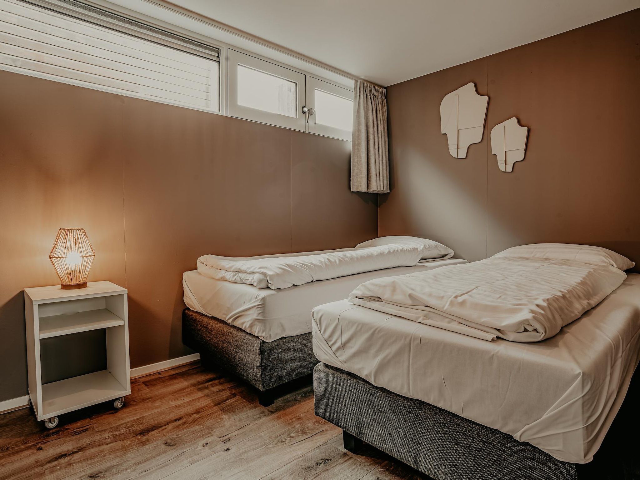 Een slaapkamer van Waterpark de Meerparel 5 in Uitgeest