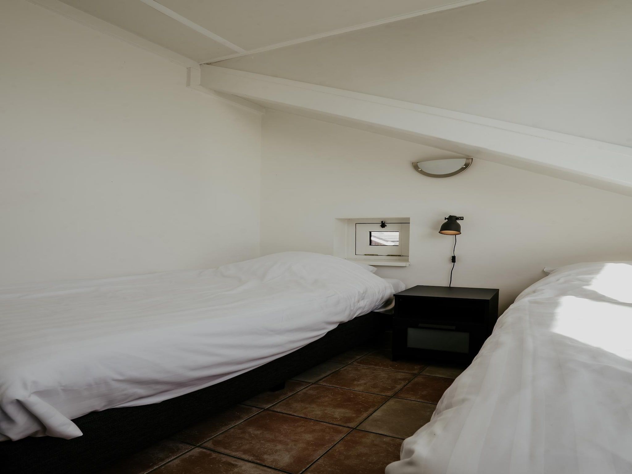 Een slaapkamer van Waterpark de Meerparel 4 in Uitgeest