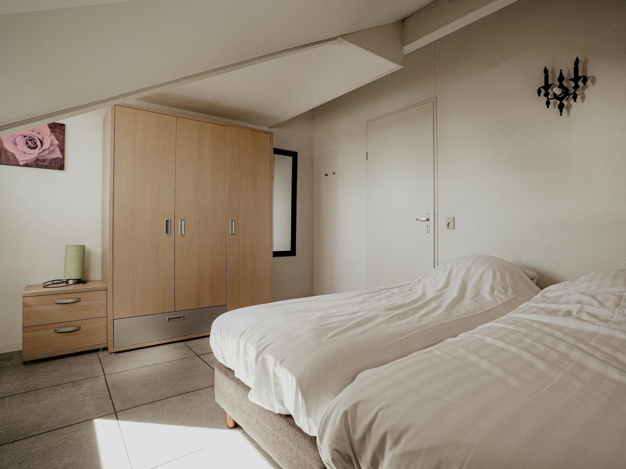 Een slaapkamer van Waterpark de Meerparel 4 in Uitgeest