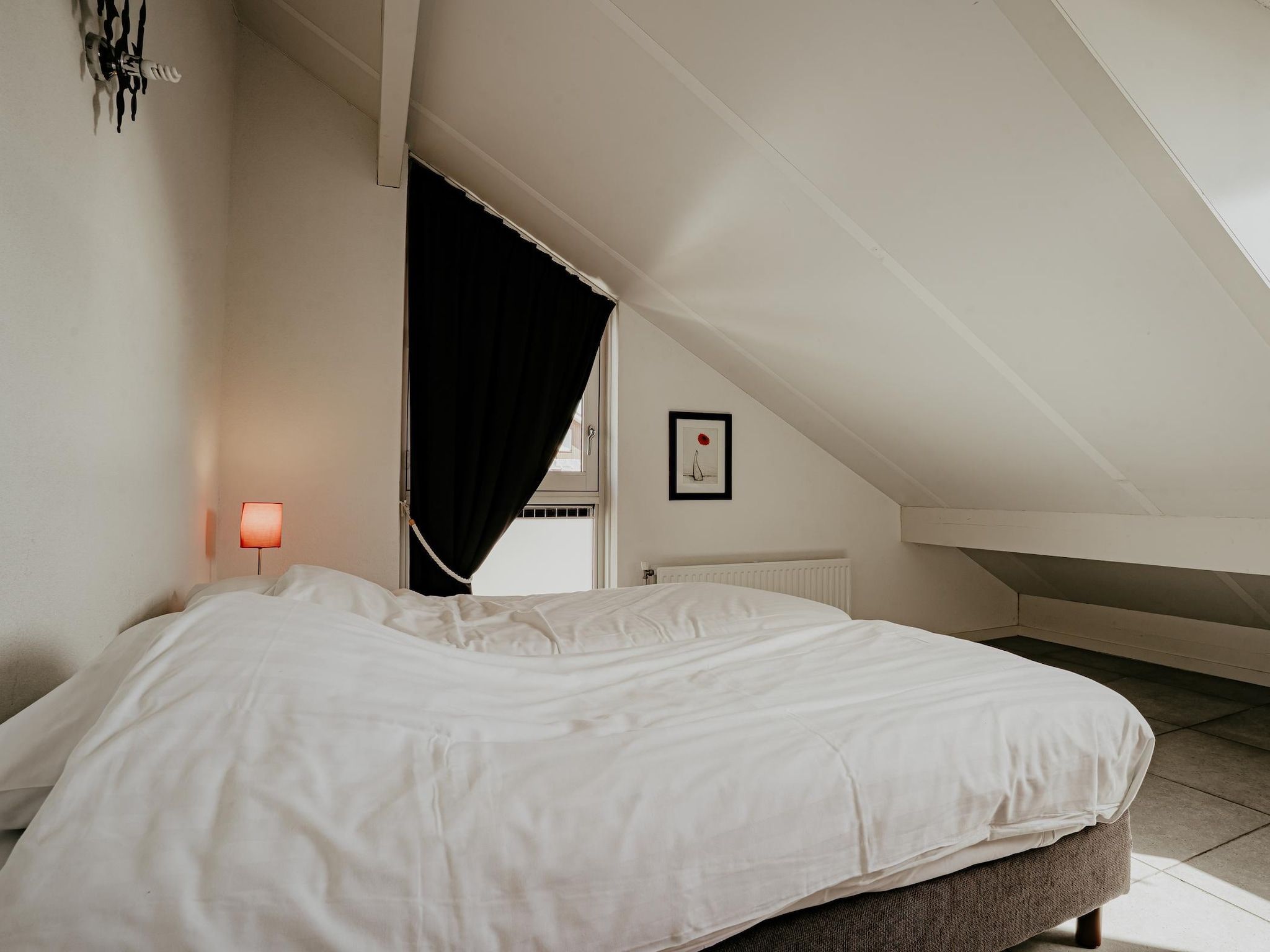 Een slaapkamer van Waterpark de Meerparel 4 in Uitgeest