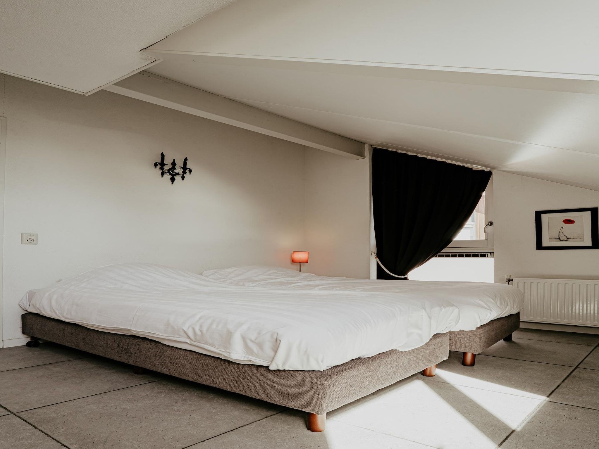 Een slaapkamer van Waterpark de Meerparel 4 in Uitgeest