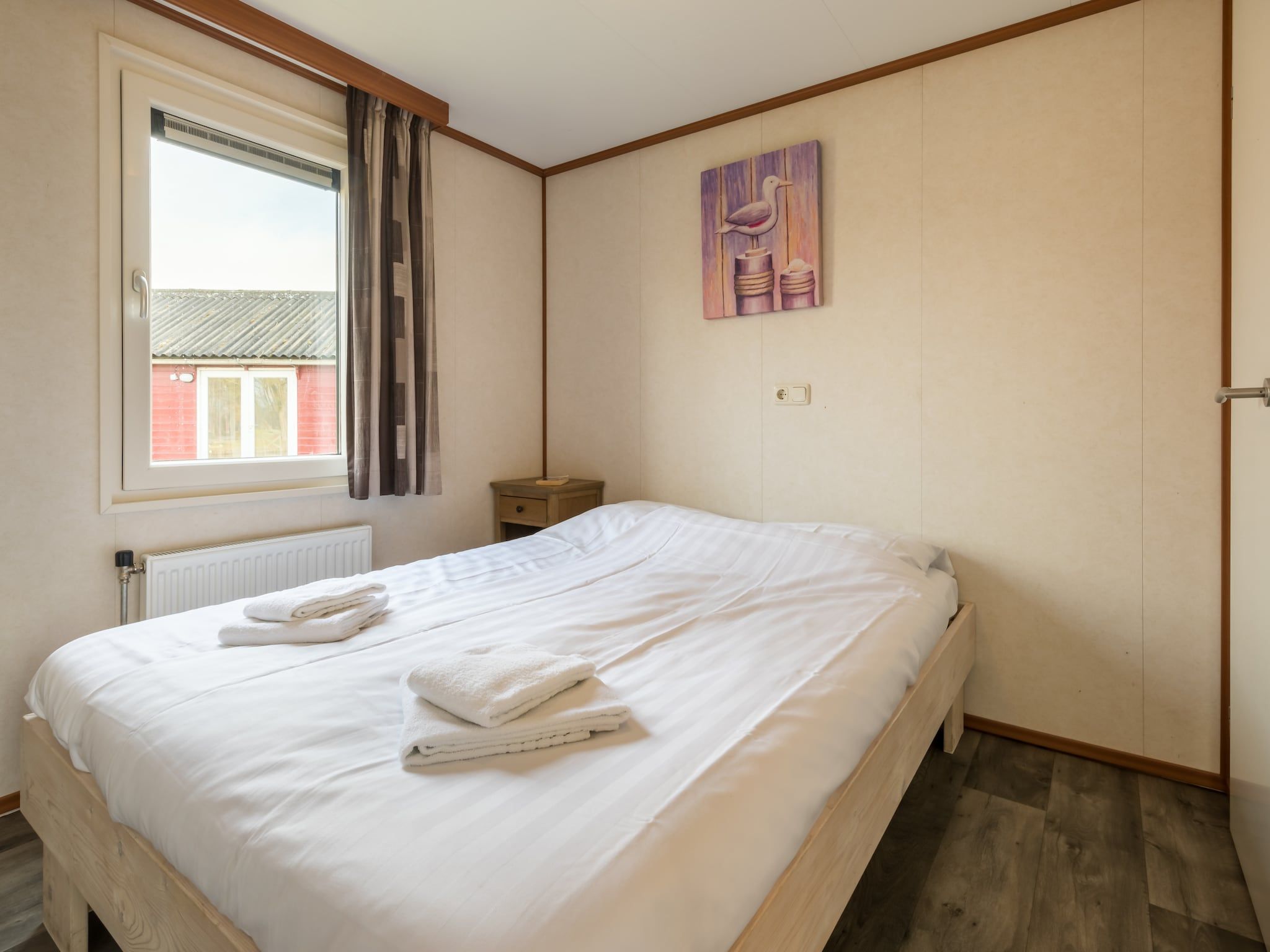 Een slaapkamer van Hunzepark 9 in Gasselternijveen