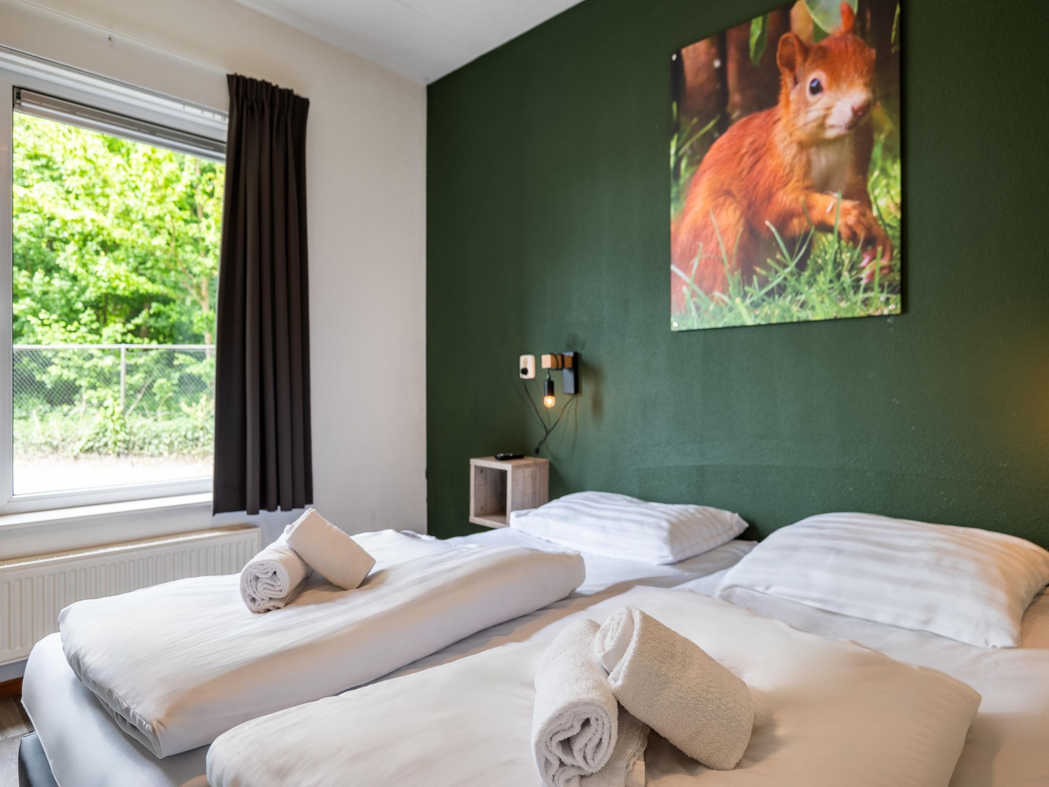 Een slaapkamer van Hunzepark 10 in Gasselternijveen